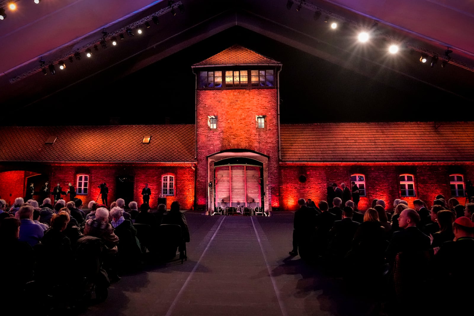 Holocaust survivors and guests sit at the Auschwitz-Birkenau former Nazi German concentration and extermination camp, during a ceremony marking the 80th anniversary of its liberation, in Oswiecim, Poland, Monday, Jan. 27. 2025. (AP Photo/Czarek Sokolowski)