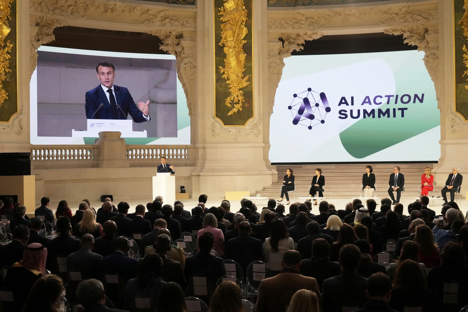 French President Emmanuel Macron addresses the audience in a closing speech at the Grand Palais during the Artificial Intelligence Action Summit in Paris, Tuesday, Feb. 11, 2025. (AP Photo/Michel Euler)