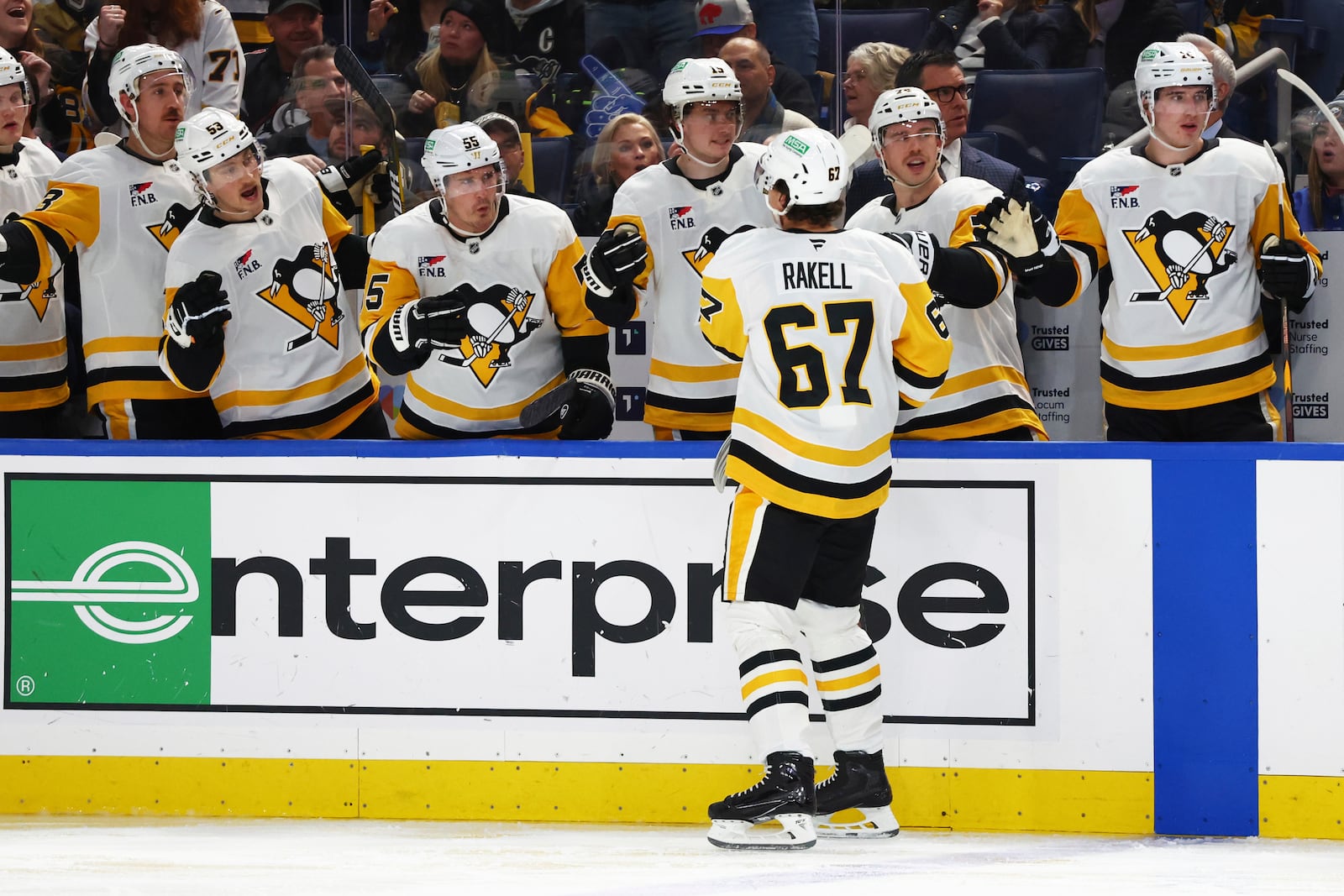 Pittsburgh Penguins right wing Rickard Rakell (67) celebrates his goal during the second period of an NHL hockey game against the Buffalo Sabres Friday, Jan. 17, 2025, in Buffalo, N.Y. (AP Photo/Jeffrey T. Barnes)