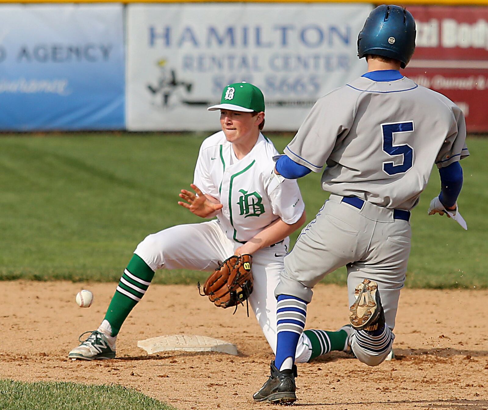 Defiance’s Braden Frederick steals second base as Badin’s Drew Holderbach awaits the throw Wednesday at Alumni Field in Hamilton. CONTRIBUTED PHOTO BY E.L. HUBBARD