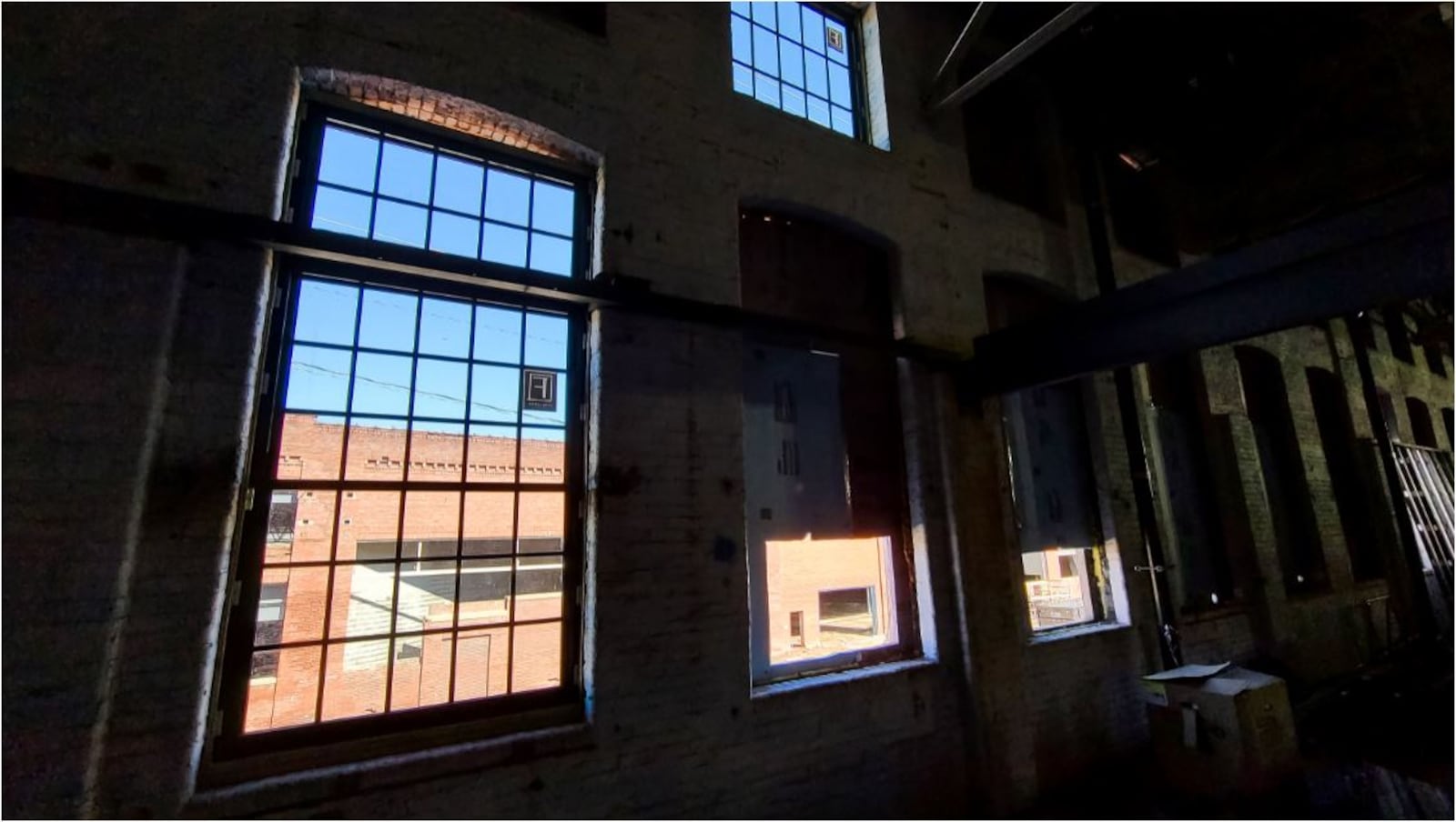 Historic windows like these, which used to face North B Street from both directions, on the walls of the former Champion Paper mill, will be installed starting in July at the new Spooky Nook Sports Champion Mill. NICK GRAHAM/STAFF