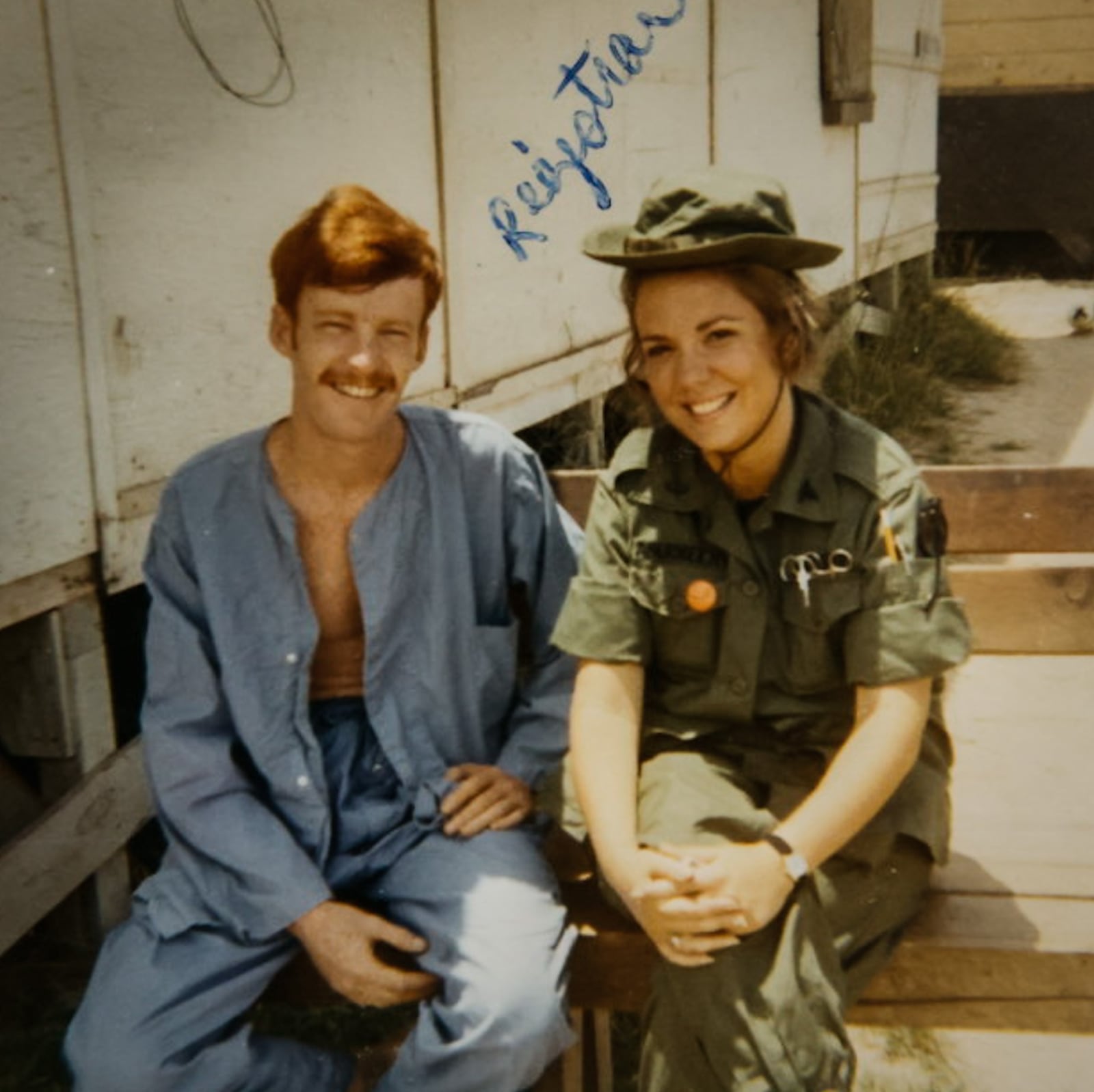 Army nurse Abby Auclair is with an injured Vietnam War solider. JIM NOELKER/STAFF