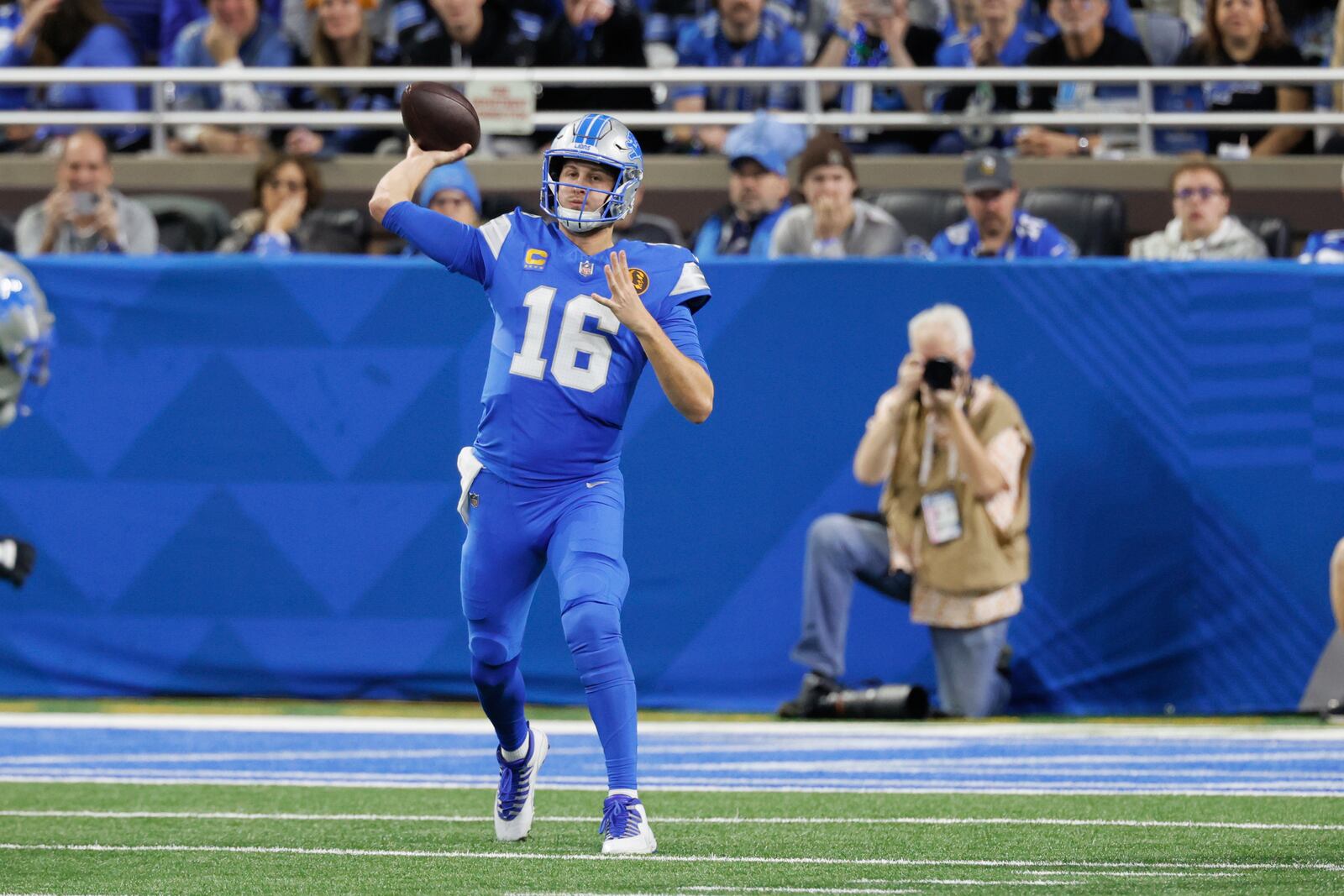 Detroit Lions quarterback Jared Goff (16) throws against the Chicago Bears during the first half of an NFL football game, Sunday, Nov. 17, 2024, in Detroit. (AP Photo/Carlos Osorio)