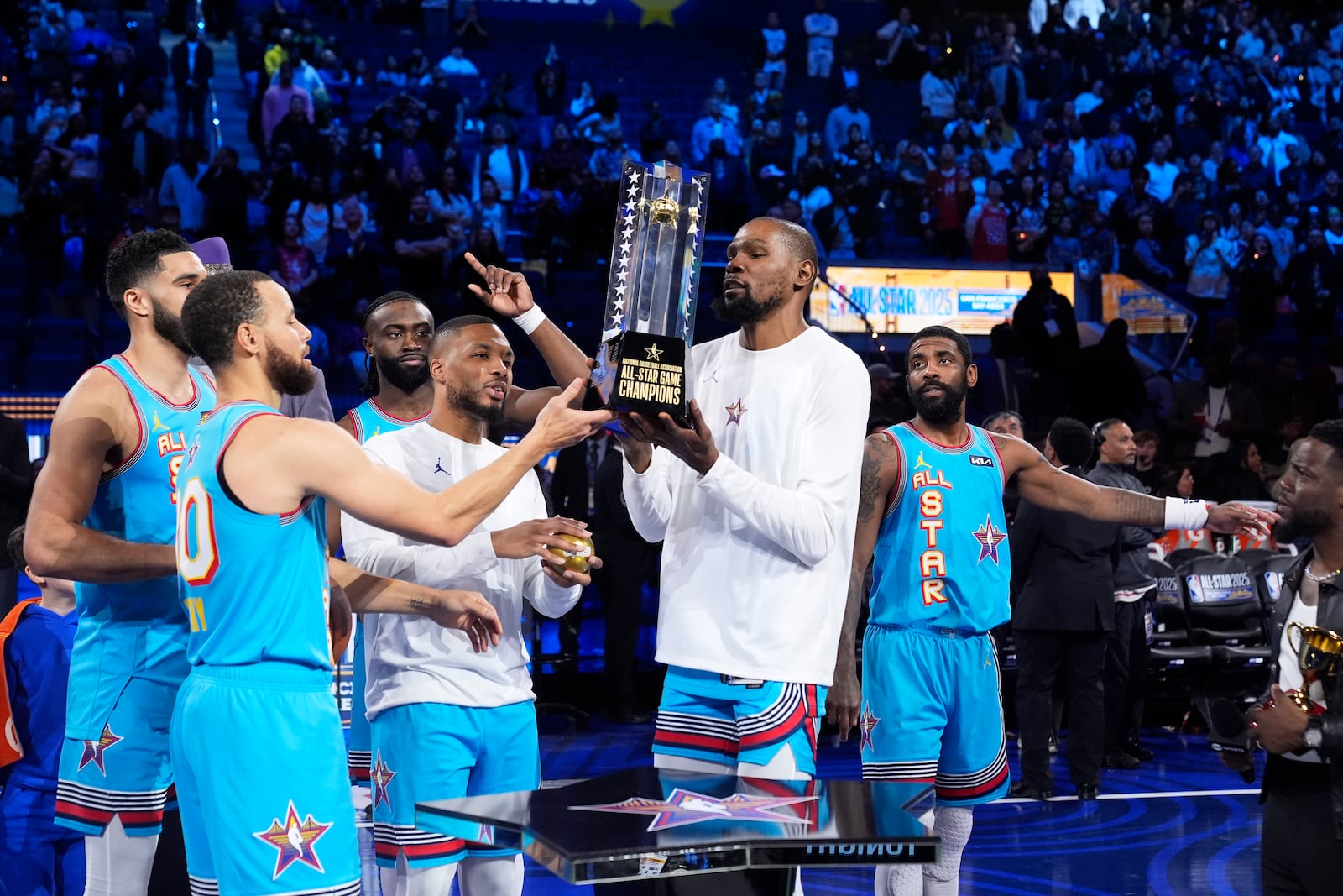 Members of Shaq's OGs celebrates after winning the NBA All-Star basketball game Sunday, Feb. 16, 2025, in San Francisco. (AP Photo/Godofredo A. Vásquez)