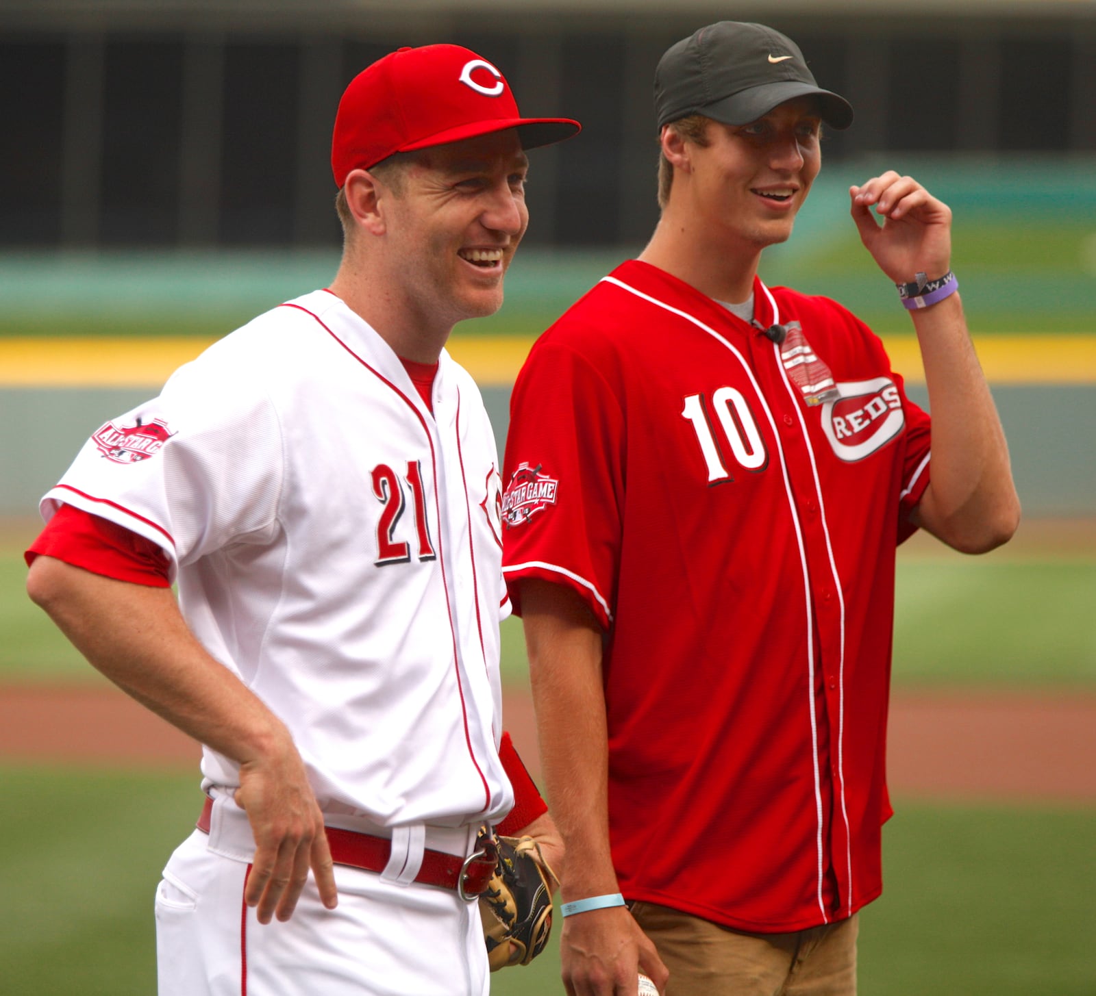 In this 2015 file photo, Franklin’s Luke Kennard, right, and Reds third baseman Todd Frazier smile after Kennard threw a ceremonial first pitch. 