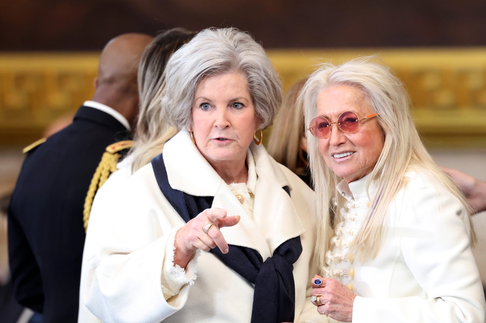 Susie Wiles, left, and Miriam Adelson arrive at the 60th Presidential Inauguration in the Rotunda of the U.S. Capitol in Washington, Monday, Jan. 20, 2025. (Kevin Lamarque/Pool Photo via AP)