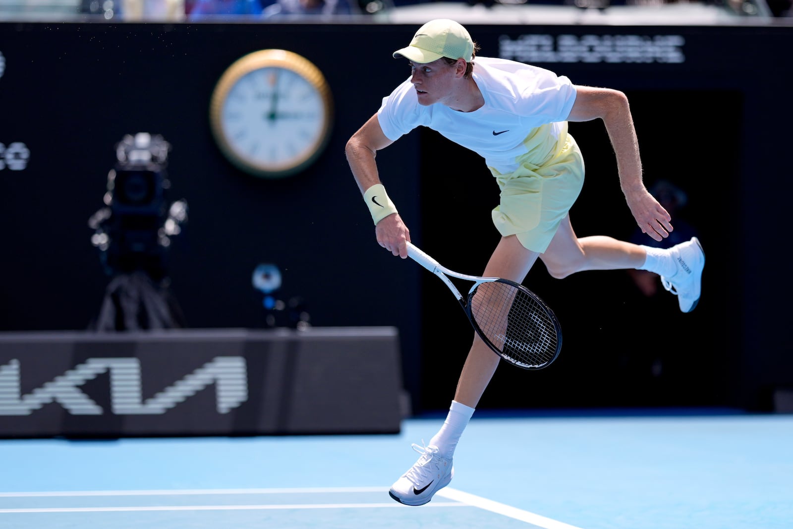 Jannik Sinner of Italy serves to Nicolas Jarry of Chile during their first round match at the Australian Open tennis championship in Melbourne, Australia, Monday, Jan. 13, 2025. (AP Photo/Asanka Brendon Ratnayake)