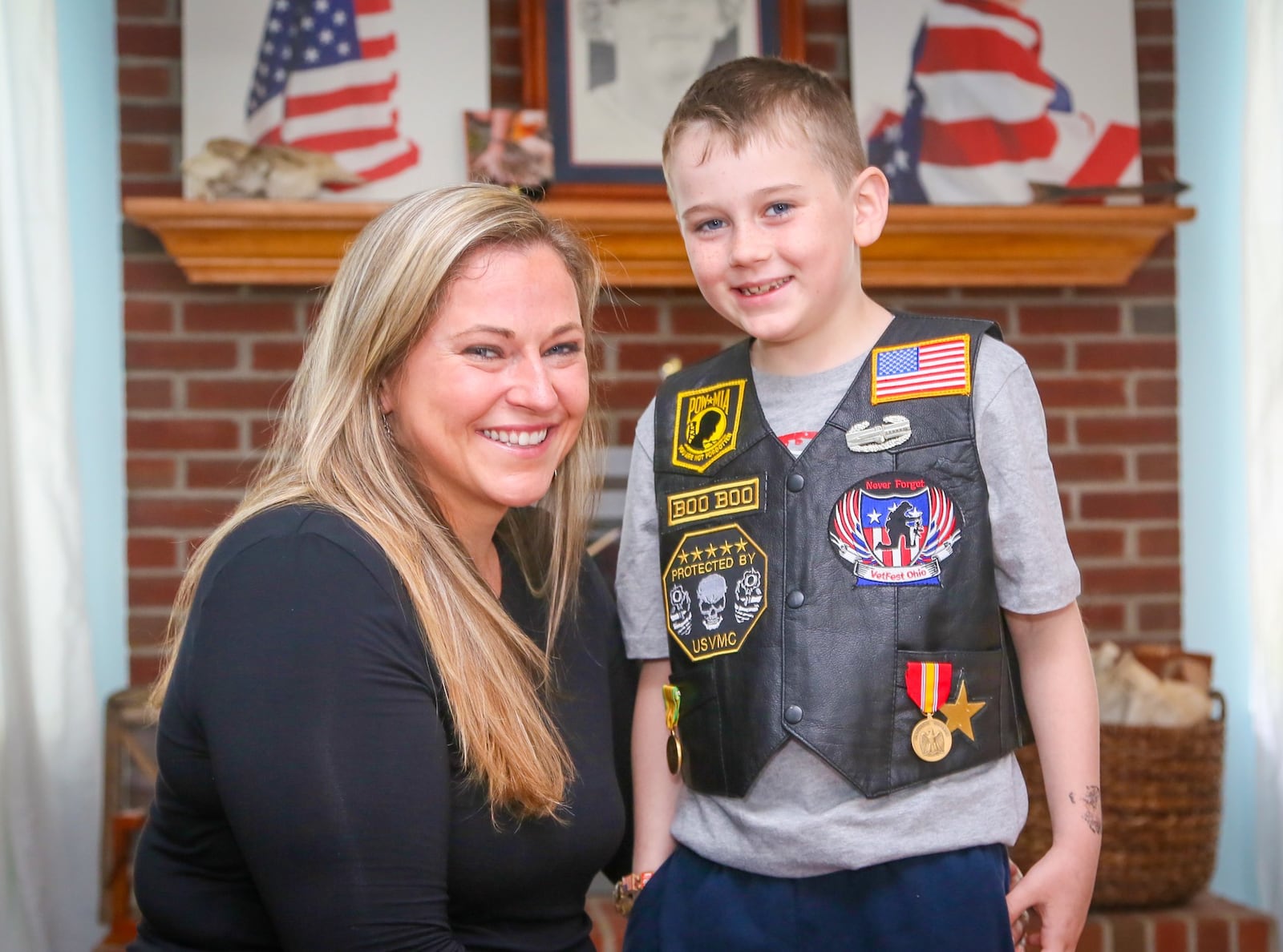 Gold Star Family Katie Luff and her son Aiden, 7, in their Hamilton home, Friday, May 19, 2017. Aiden asked to invite Military Service Veterans to his birthday party so he can feel closer to his dad, Army Sgt. David J. Luff Jr., who was killed in Iraq. GREG LYNCH / STAFF