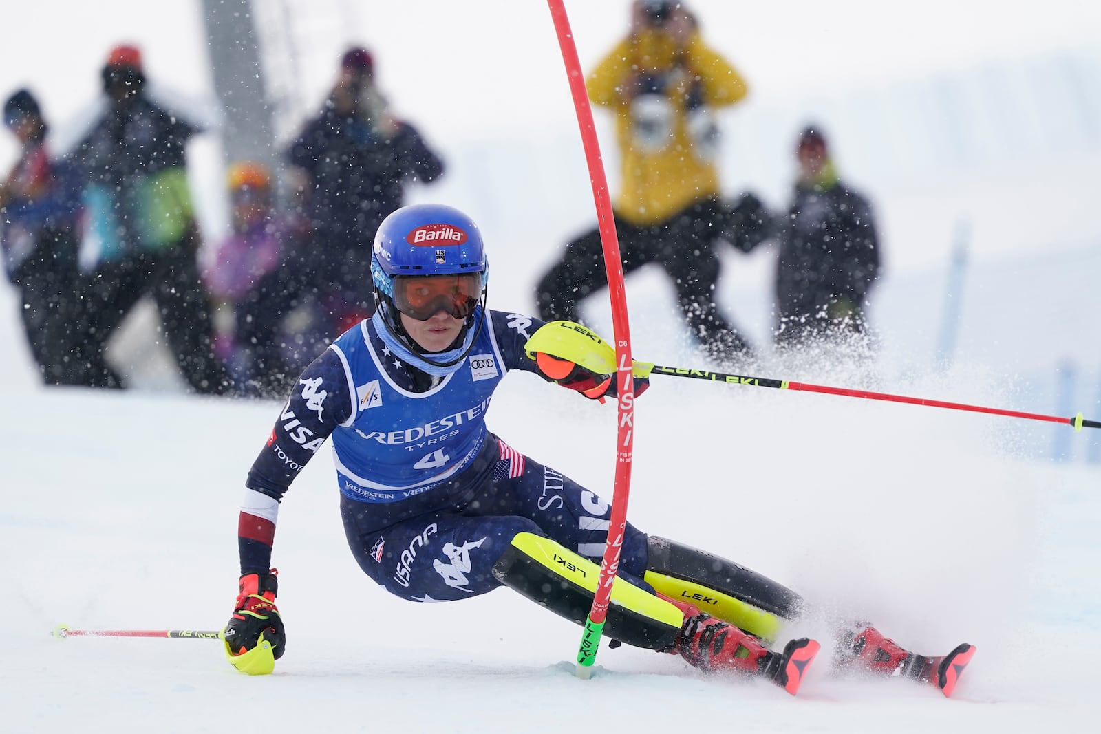 United States' Mikaela Shiffrin speeds down the course during an alpine ski, women's World Cup slalom, in Sestriere, Italy, Sunday, Feb. 23, 2025. (AP Photo/Piermarco Tacca)