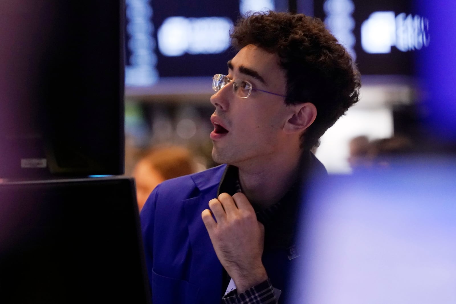 Specialist Alexander Weitzman work on the floor of the New York Stock Exchange, Tuesday, March 11, 2025. (AP Photo/Richard Drew)