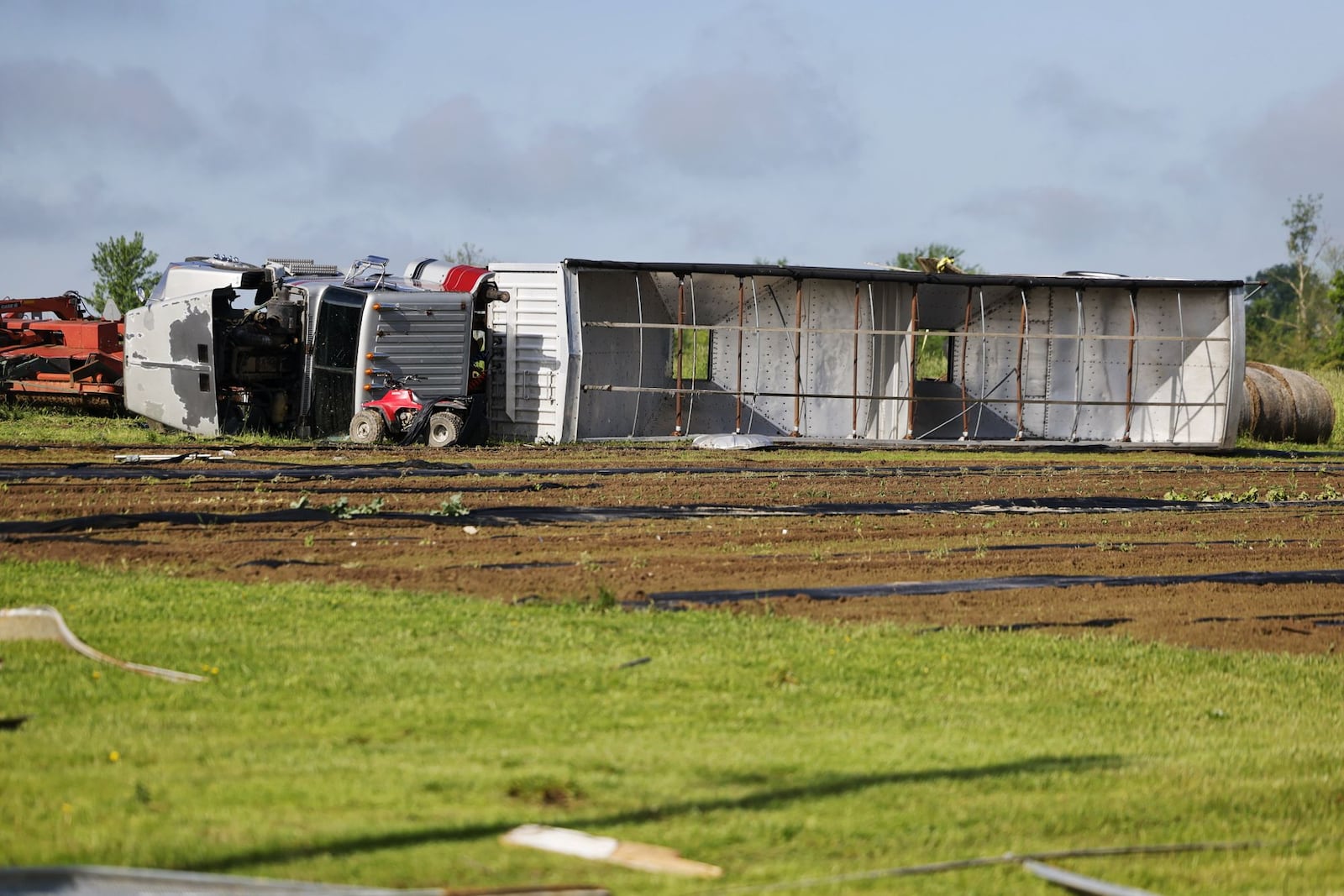 Several silos, power lines and vehicles were destroyed at a farm on Stillwell Beckett Road in Reily Township after storms ripped through Tuesday night May 7 in Butler County. NICK GRAHAM/STAFF