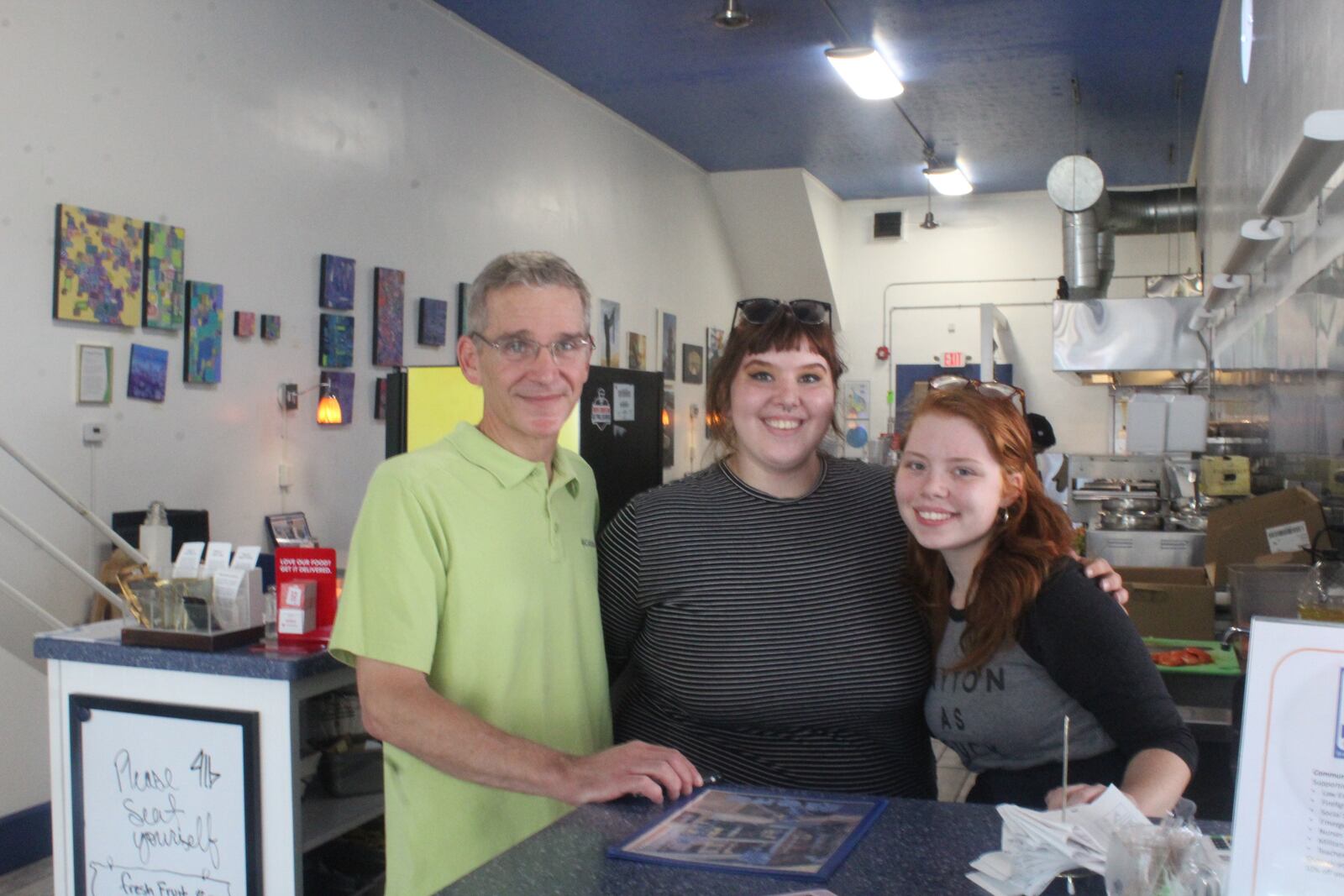 The Oregon District continues to recover from Sunday's morning mass shooting.  Pictured: 416 Diner owner Guy Fragmin and his employees Meghan Ashley Eisinger and Aurora Azbill .