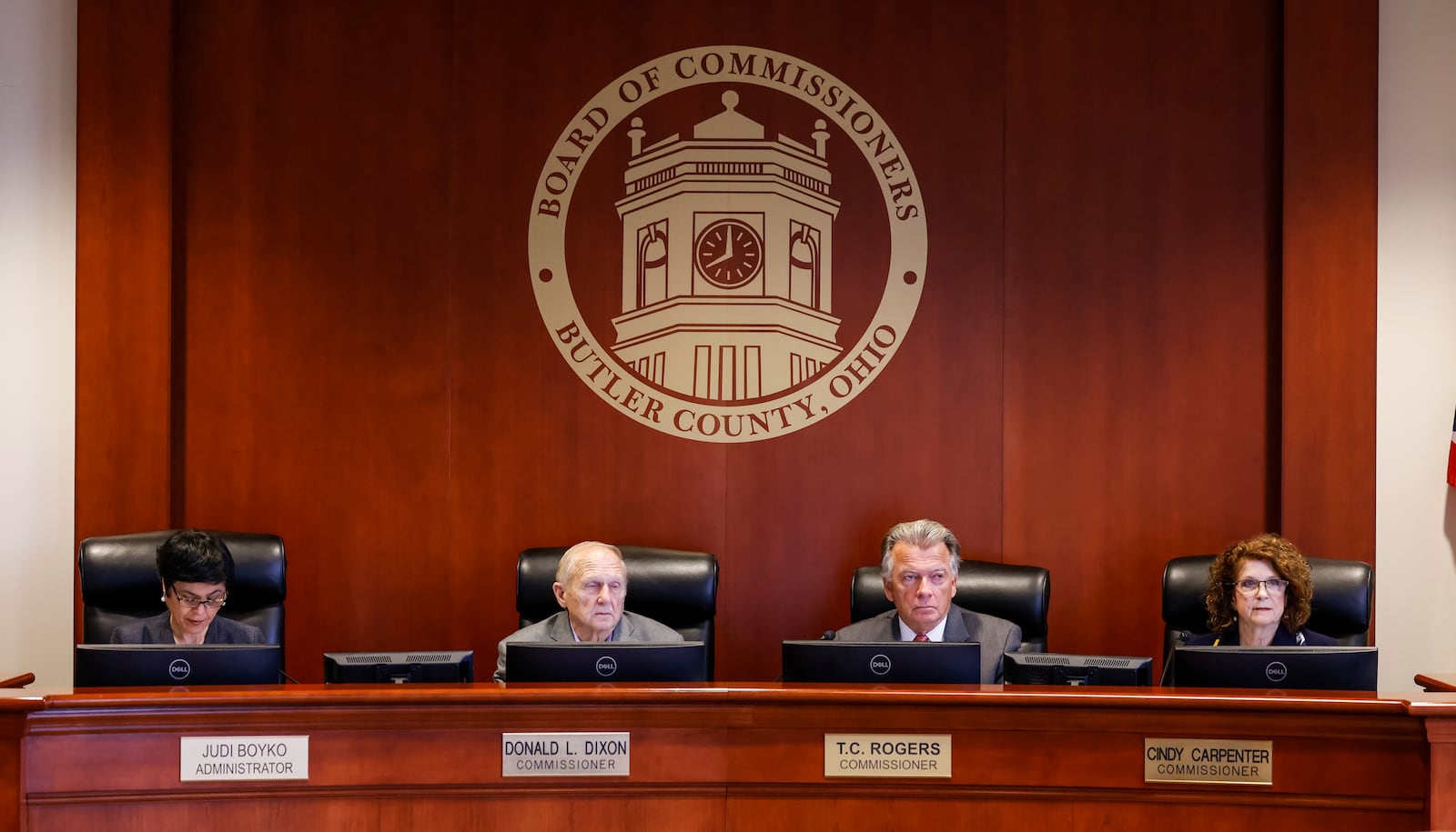 Butler County Administrator Judi Boyko, left, and Butler County Commissioners Donald Dixon, T.C. Rogers and Cindy Carpenter listen to comments during a commission meeting Monday, Jan. 10, 2022 at the Butler County Government Services Center in Hamilton. NICK GRAHAM / STAFF