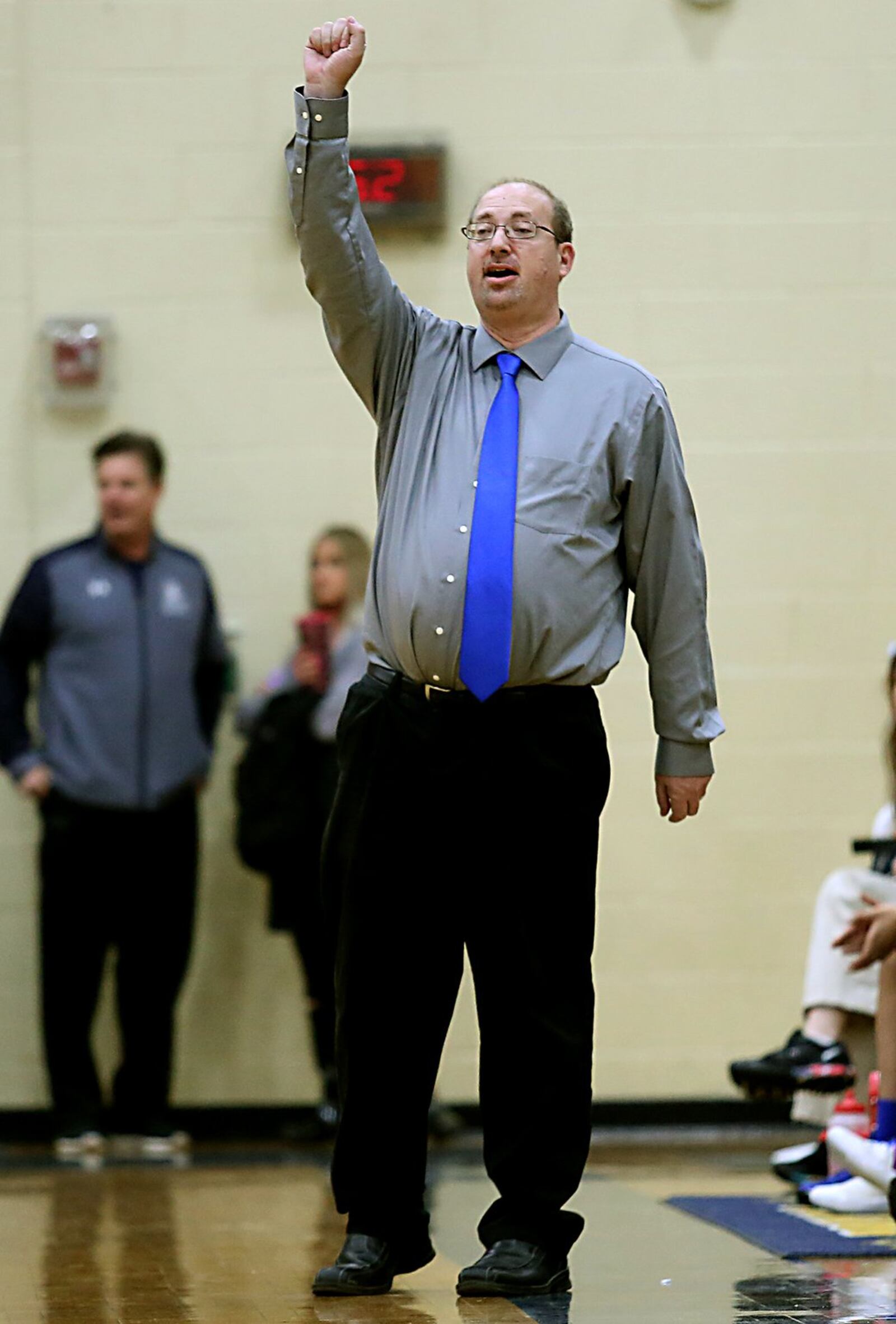 Middletown Christian coach Ken Yablonsky signals a play as his team battles Fayetteville during Division IV sectional play at Monroe on Tuesday night. CONTRIBUTED PHOTO BY E.L. HUBBARD