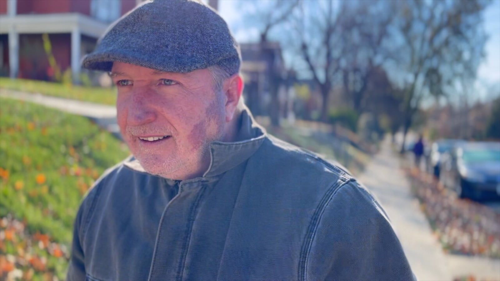 Ken Carroll walks around his neighborhood in East Price Hill. Carroll attended the Freezer Bowl game in 1982. Keith BieryGolick/WCPO