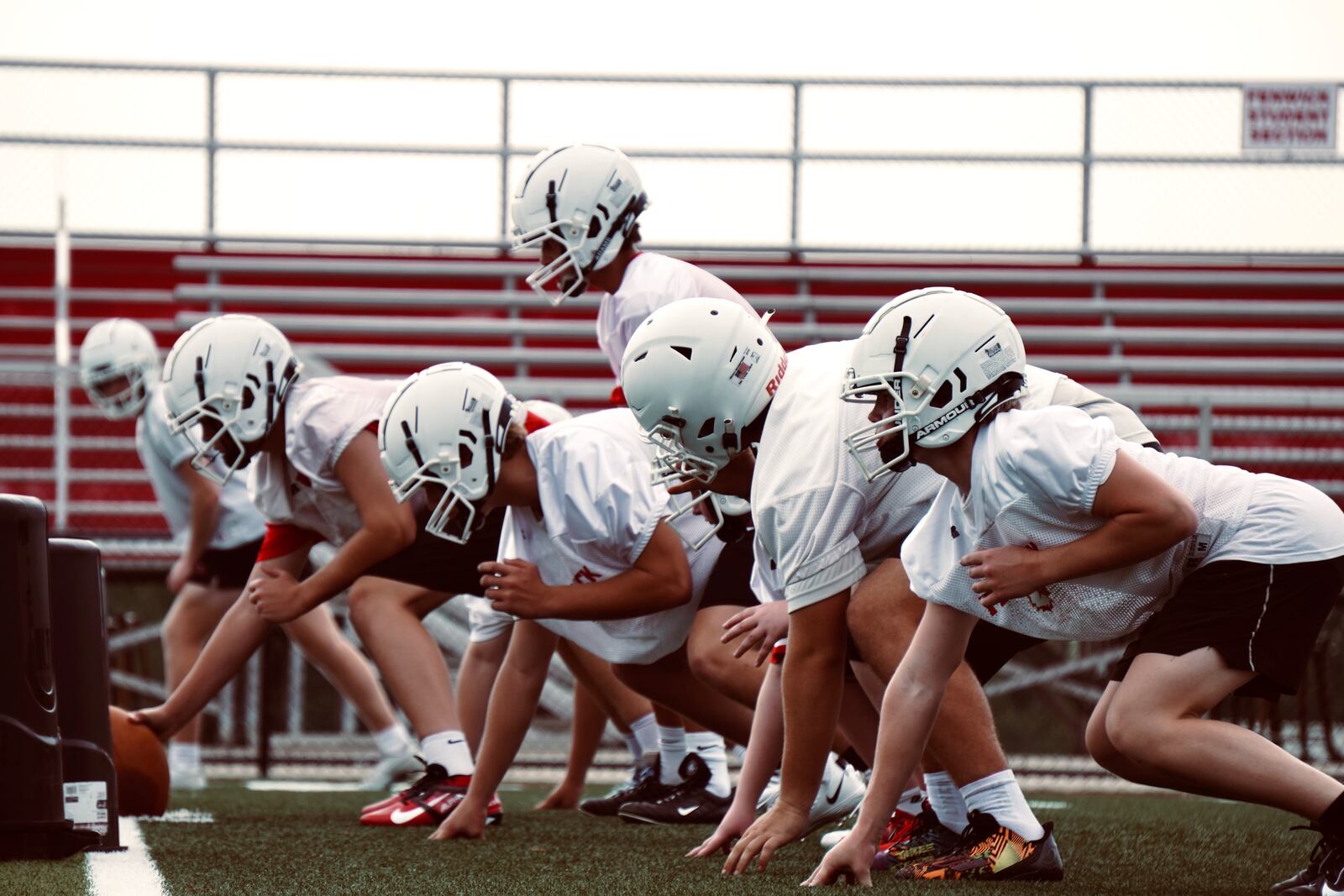 Fenwick players line up to run a play during practice in July 2024 at Fenwick High School. Photo by Chris Vogt