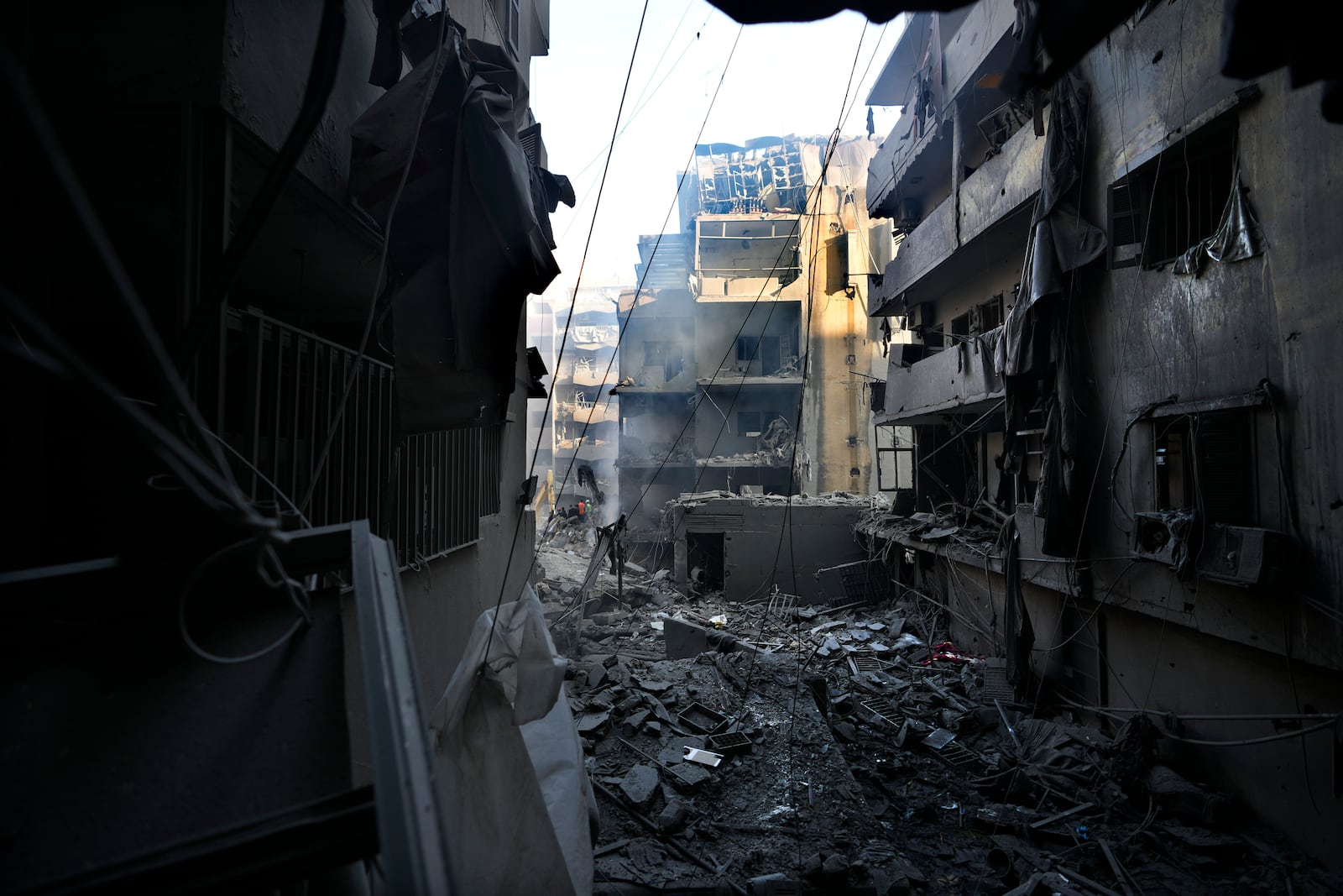 Destroyed buildings are seen at the site of an Israeli airstrike that hit central Beirut, Lebanon, Saturday, Nov. 23, 2024. (AP Photo/Hassan Ammar)