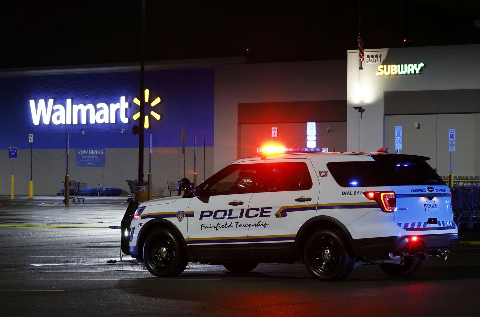 Police investigate a fatal shooting at Walmart on Princeton Road in Fairfield Township Thursday, May 26, 2022. NICK GRAHAM/STAFF