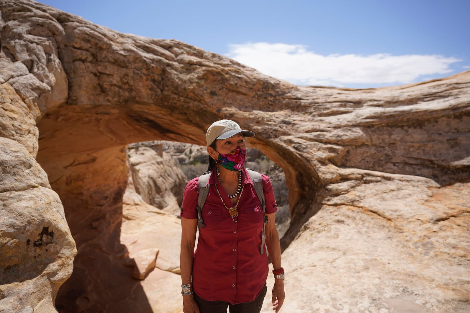 FILE - U.S. Interior Secretary Deb Haaland tours near ancient dwellings along the Butler Wash trail during a visit to Bears Ears National Monument Thursday, April 8, 2021, near Blanding, Utah. (AP Photo/Rick Bowmer, Pool, File)