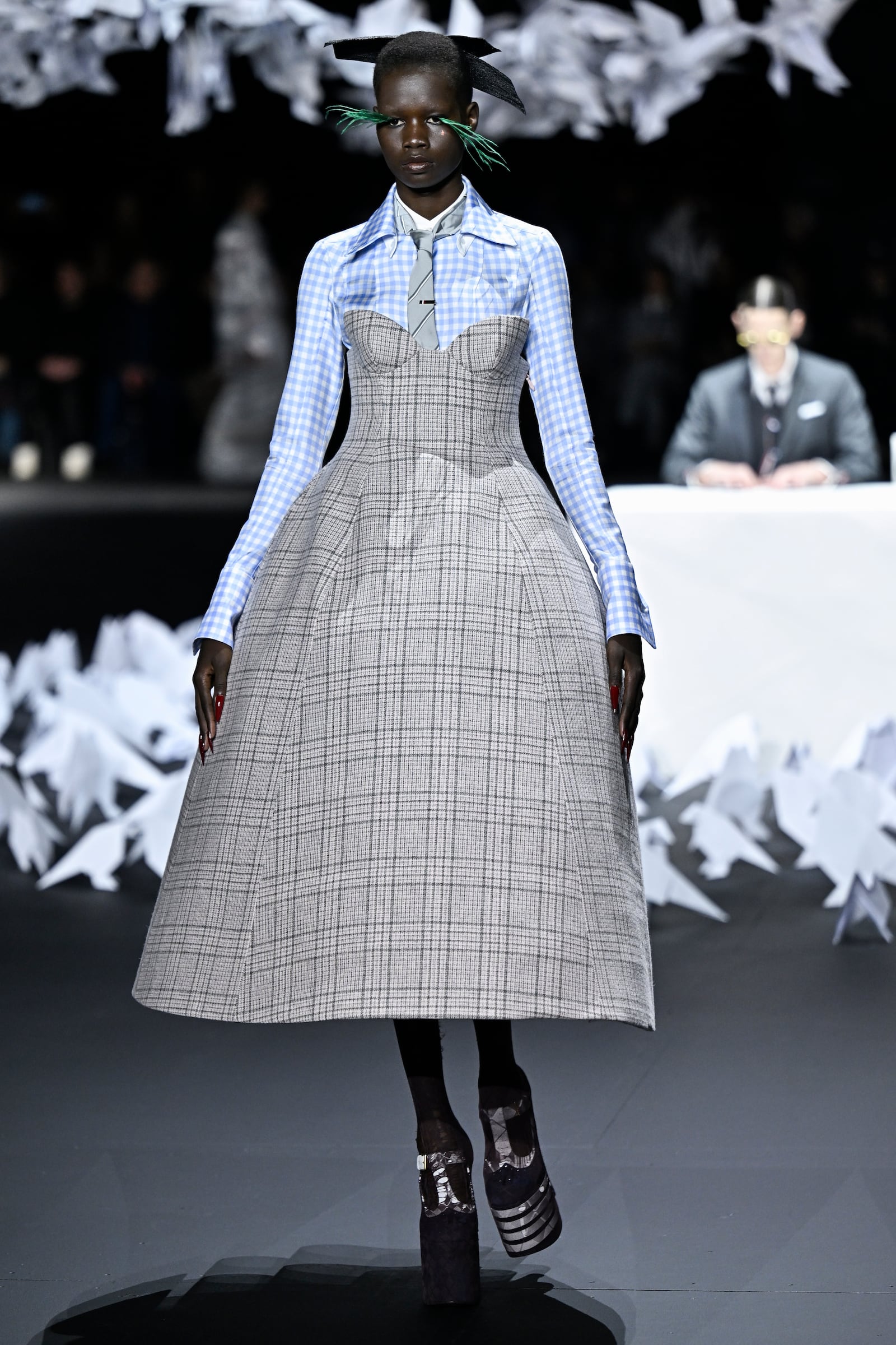 A model walks the runway during the Thom Browne Fall/Winter 2025 fashion show as part of New York Fashion Week on Tuesday, Feb. 11, 2025, at The Shed in New York. (Photo by Evan Agostini/Invision/AP)