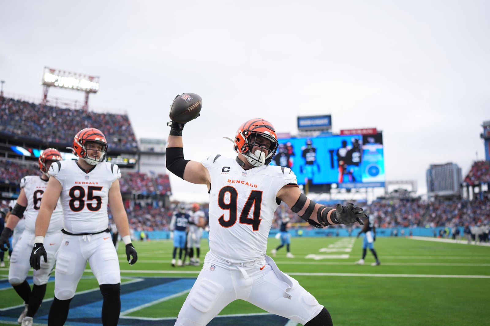 Cincinnati Bengals defensive end Sam Hubbard (94) celebrates a touchdown during the first half of an NFL football game against the Tennessee Titans, Sunday, Dec. 15, 2024, in Nashville, Tenn. (AP Photo/George Walker IV)