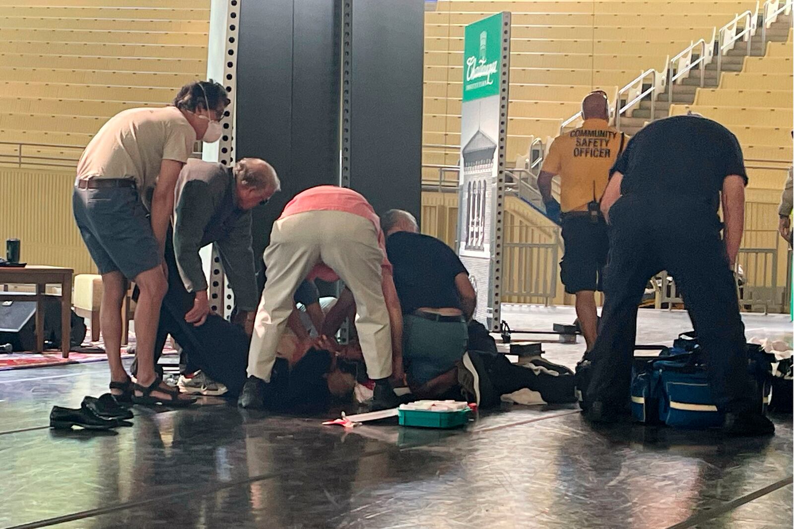 FILE - Author Salman Rushdie is tended to after he was attacked during a lecture, Aug. 12, 2022, at the Chautauqua Institution in Chautauqua, N.Y. (AP Photo/Joshua Goodman, File)