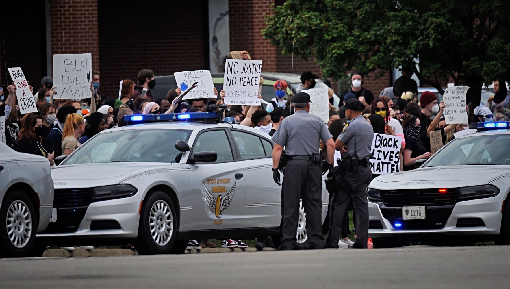 PHOTOS: Tear gas used during Beavercreek protest at busy intersection