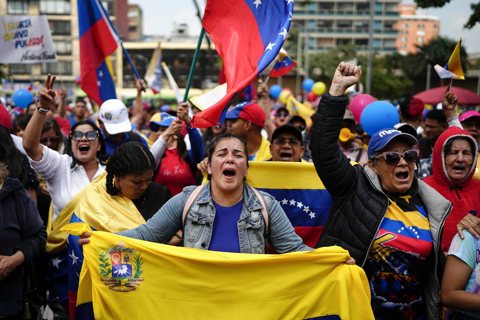 Opponents of Venezuelan President Nicolas Maduro protest the day before his inauguration for a third term in Bogota, Colombia, Thursday, Jan. 9, 2025. (AP Photo/Ivan Valencia)