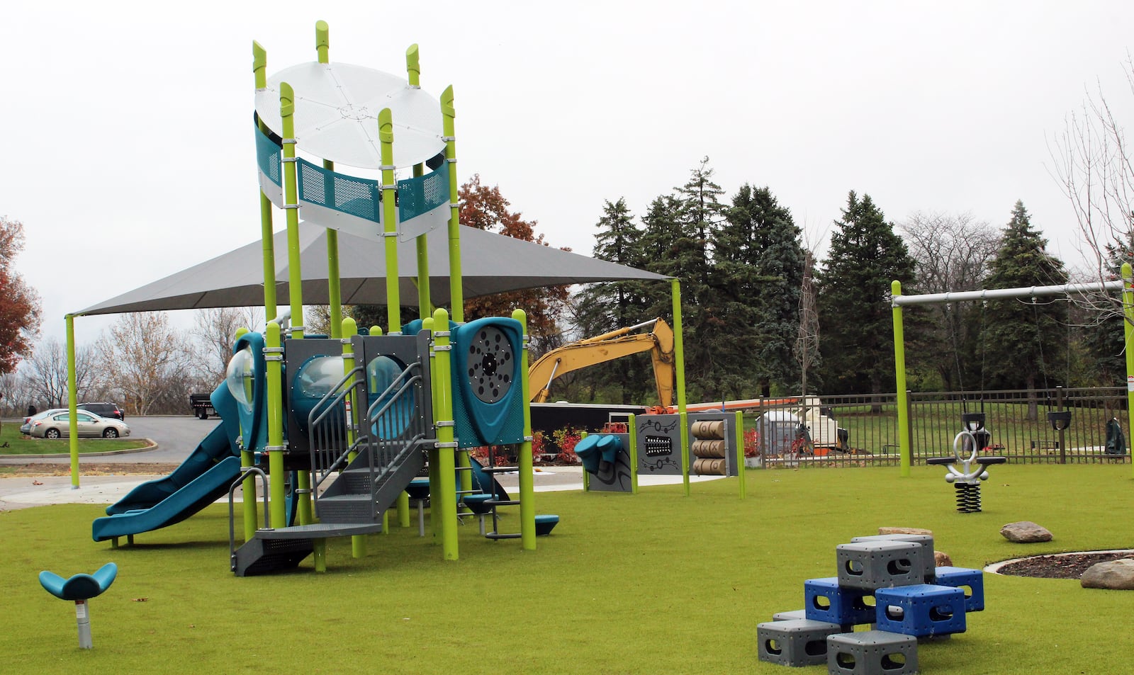 Situated on artificial turf, the 70-foot by 200-foot playground area in Harbin Park in Fairfield sits adjacent to a new splash pad expected to open next spring after several delays in getting permits from the Ohio Department of Health. The playground features two separate areas — one with equipment targeted for children ages 6-12; the second aimed at 2- to 5-year-olds. This is the one for 2-5 year-olds. CONTRIBUTED