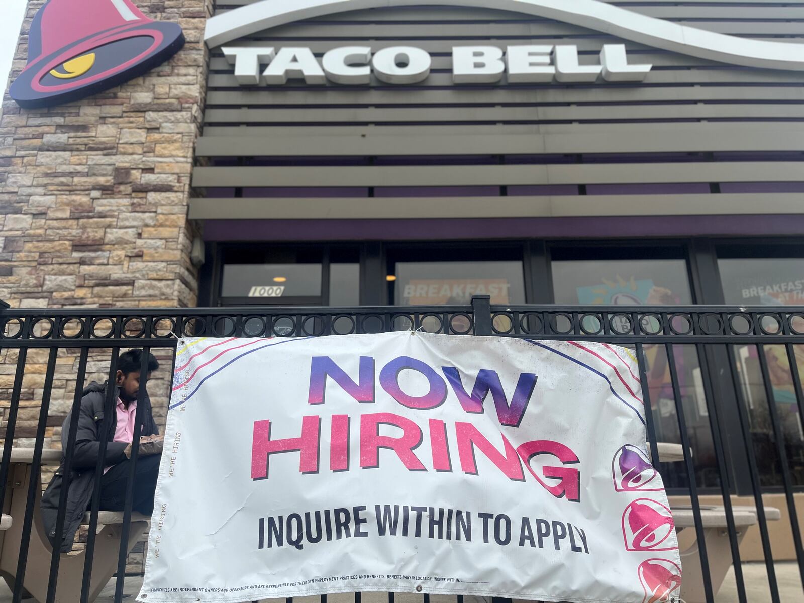 A now hiring sign outside of the Taco Bell on Brown Street near the University of Dayton. A string of businesses on Brown Street have help wanted or now hiring signs, including Burger King, Hot Head Burritos, Subway, Starbucks, Panera Bread, Chipotle, Bibibop, Fusion, Penn Station, Skyline Chili and Five Guys. CORNELIUS FROLIK / STAFF