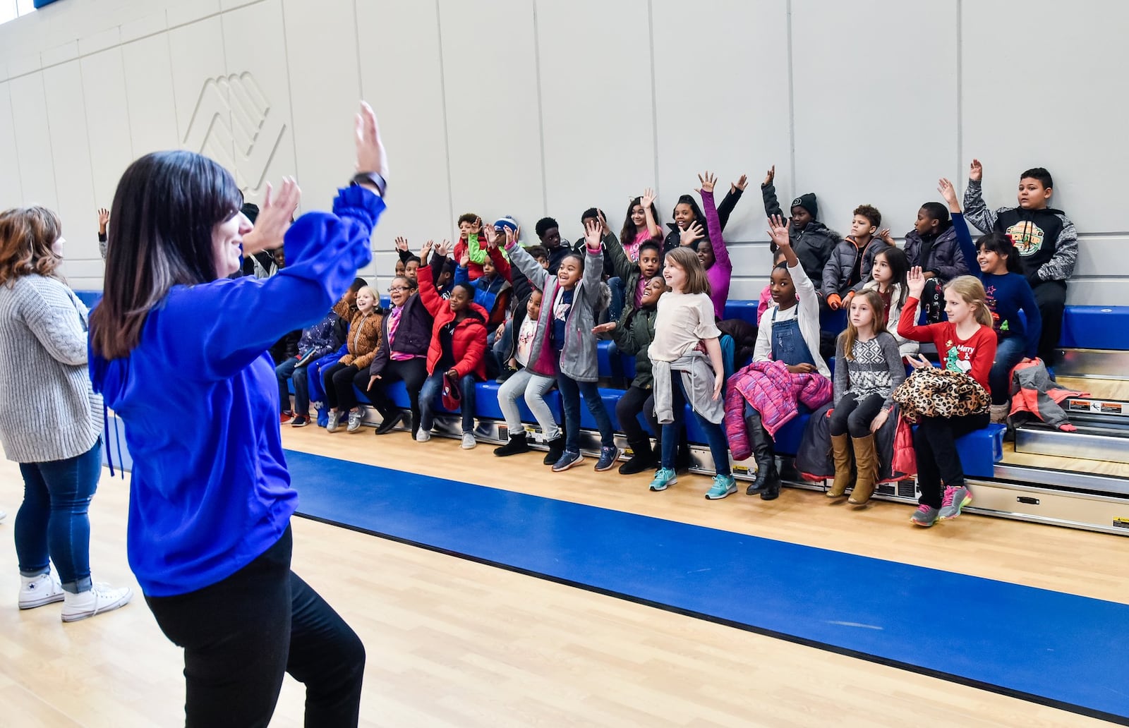 Chief Executive Officer Bridget Graber speaks to the children in the new Boys and Girls Club of West Chester/Liberty building during a tour of the facility Wednesday, Dec. 20. Sixty children took a field trip from the current location to see what they will move in to after the holiday break. NICK GRAHAM/STAFF