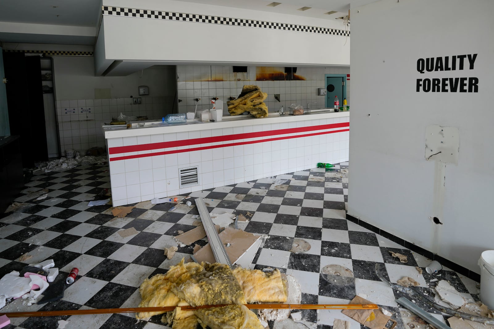 A view shows one of the restaurants at Hotel Yugoslavia, once a symbol of progress in the former socialist state of Yugoslavia that broke apart in the 1990s and a favorite gathering place for local residents as well as world leaders, in Belgrade, Serbia, Thursday, Oct. 3, 2024. (AP Photo/Darko Vojinovic)