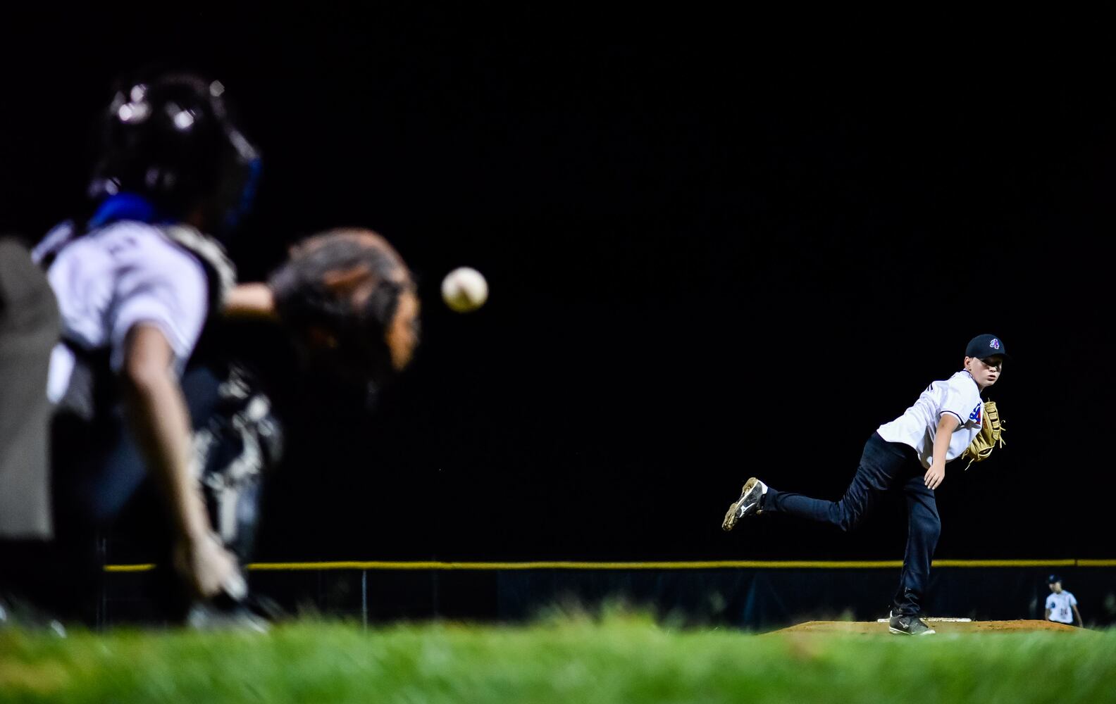 Youth baseball teams get back in action just after midnight