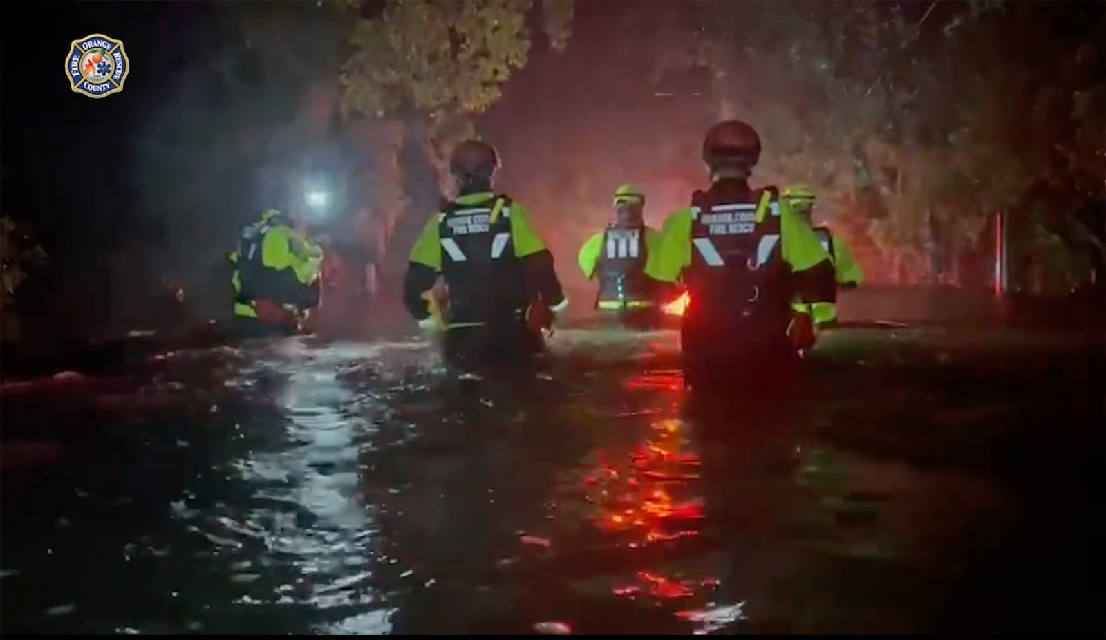 This photo provided by Orange County Fire Rescue Department shows OCFRD along with OCSO working on water rescues after Hurricane Milton early Thursday, Oct. 10, 2024 in Orange County, Fla. (Orange County Fire Rescue Department via AP)