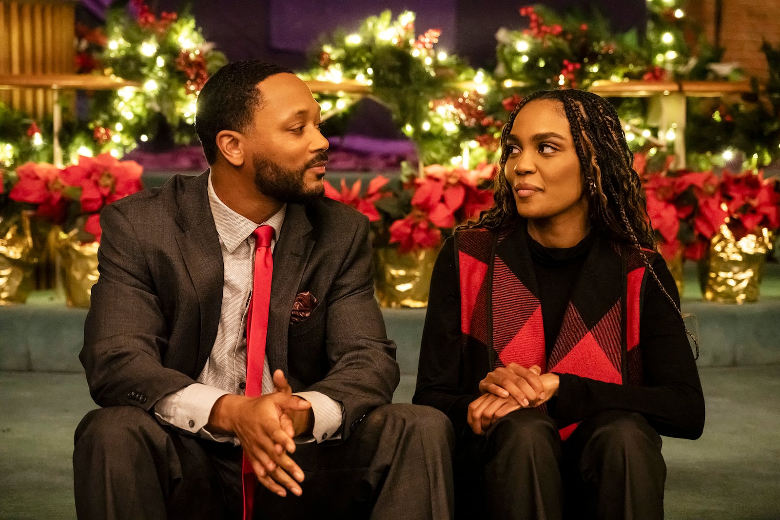 This image released by BET+ shows Romeo Miller, left, and China Anne McClain in a scene from “Brewster's Millions: Christmas." (BET+ via AP)