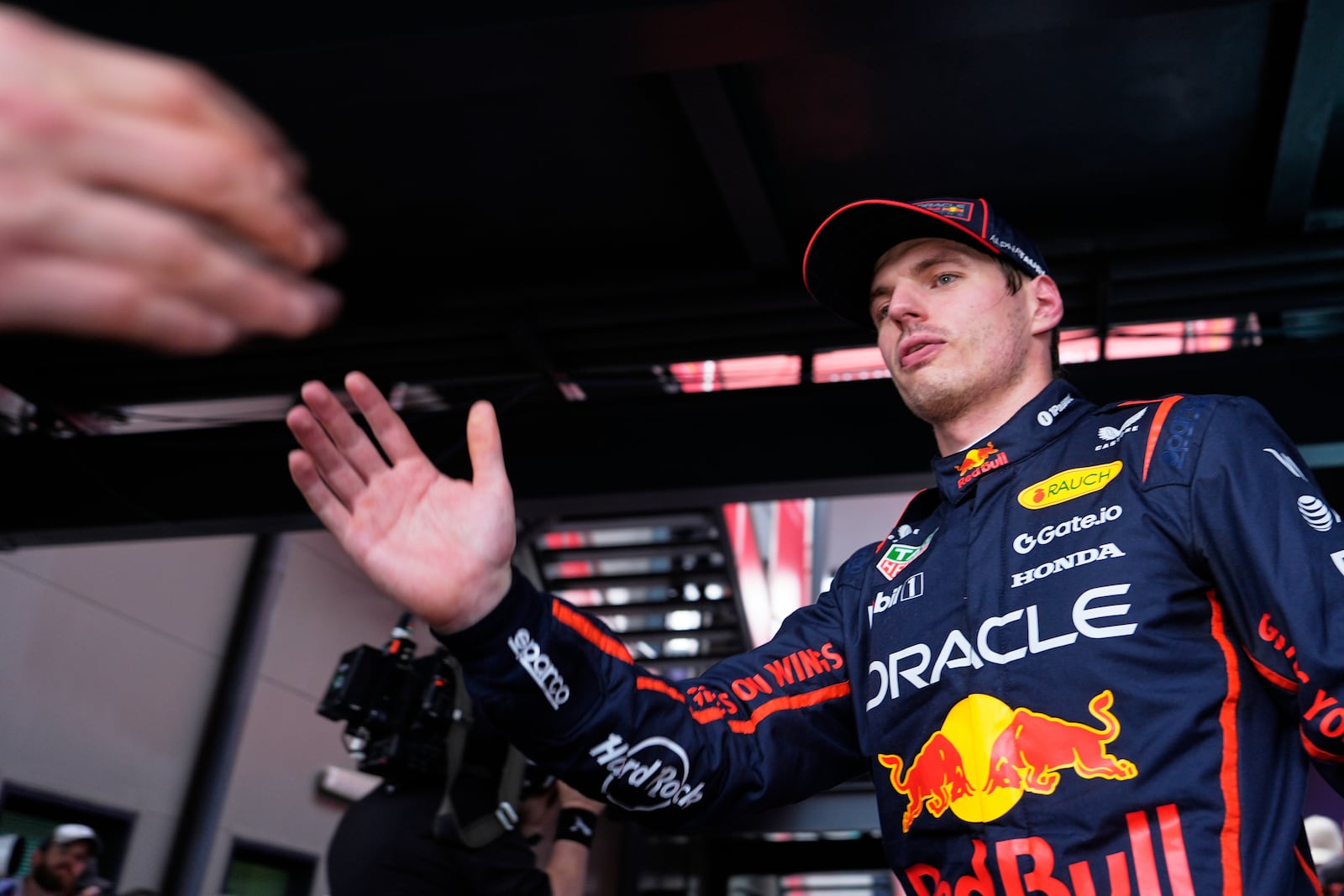 Red Bull driver Max Verstappen of the Netherlands reacts after his third place finish in qualifying at the Australian Formula One Grand Prix at Albert Park, in Melbourne, Australia, Saturday, March 15, 2025. (AP Photo/Asanka Brendon Ratnayake)