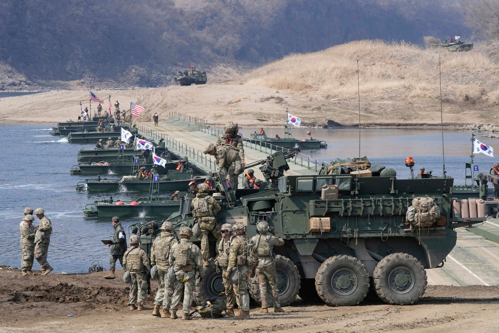 U.S. Army soldiers participate in a joint river-crossing exercise between South Korea and the United States as a part of the Freedom Shield military exercise in Yeoncheon, South Korea, Thursday, March 20, 2025. (AP Photo/Ahn Young-joon)