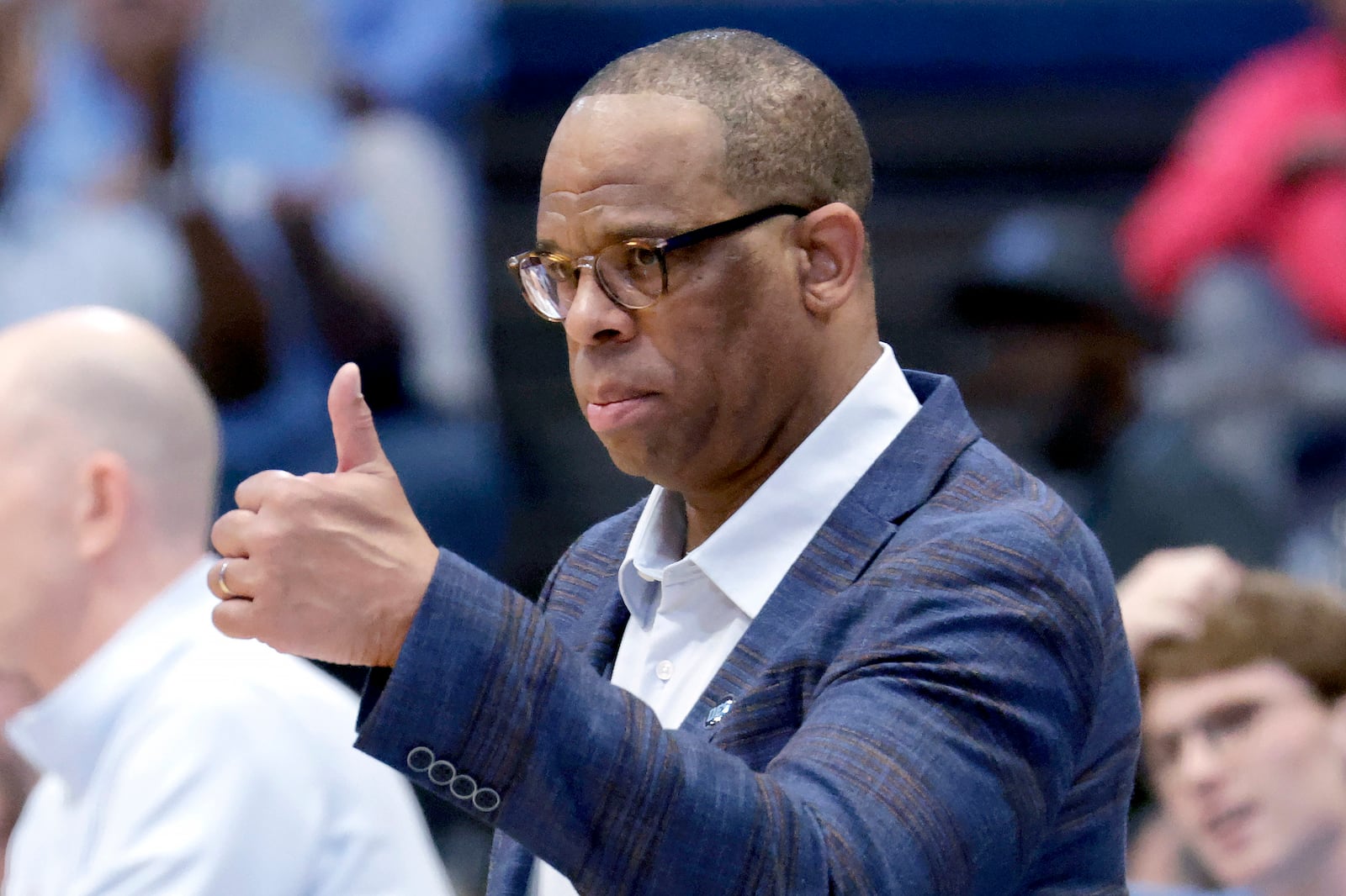 North Carolina head coach Hubert Davis gives a thumbs up to a player during the second half of an NCAA college basketball game against Miami, Saturday, March 1, 2025, in Chapel Hill, N.C. (AP Photo/Chris Seward)