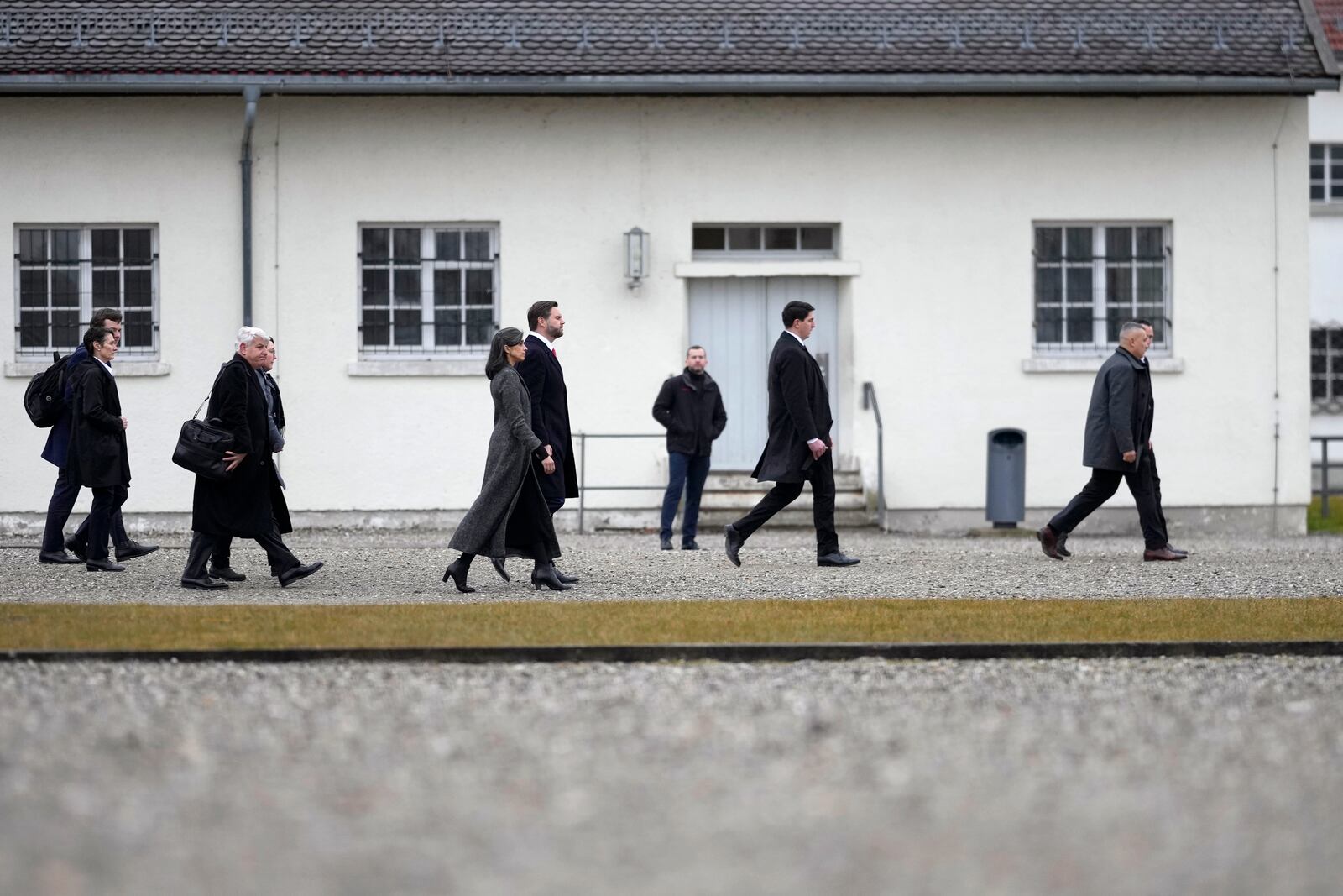 U.S. Vice President JD Vance and second lady Usha Vance, center, visit the Dachau Concentration Camp Memorial Site outside Munich, Germany, Thursday, Feb. 13, 2025. (AP Photo/Matthias Schrader)