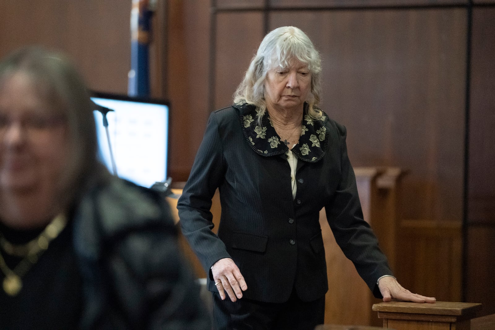 The trial continues for Marshella Chidester, who leaves her court seat during a break in the Monroe County Courthouse courtroom Thursday, March 6, 2025, in Monroe, Mich. (Mandi Wright/Detroit Free Press via AP)