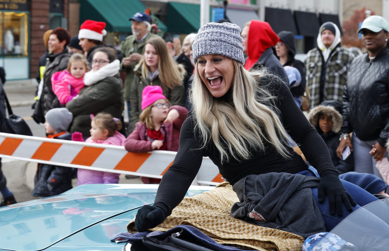 Middleown native Kayla Harrison, a two-time Olympic gold medalist, served as grand marshal for the Santa Parade kicking off Middletown Holiday Whopla events this year in downtown Middletown. NICK GRAHAM / STAFF