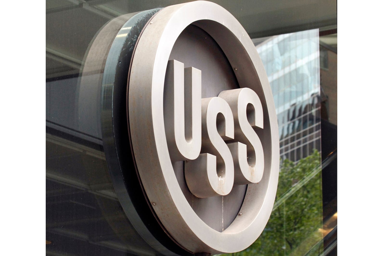 FILE - The United States Steel logo is pictured outside the headquarters building in downtown Pittsburgh, April 26, 2010. (AP Photo/Gene J. Puskar, File)