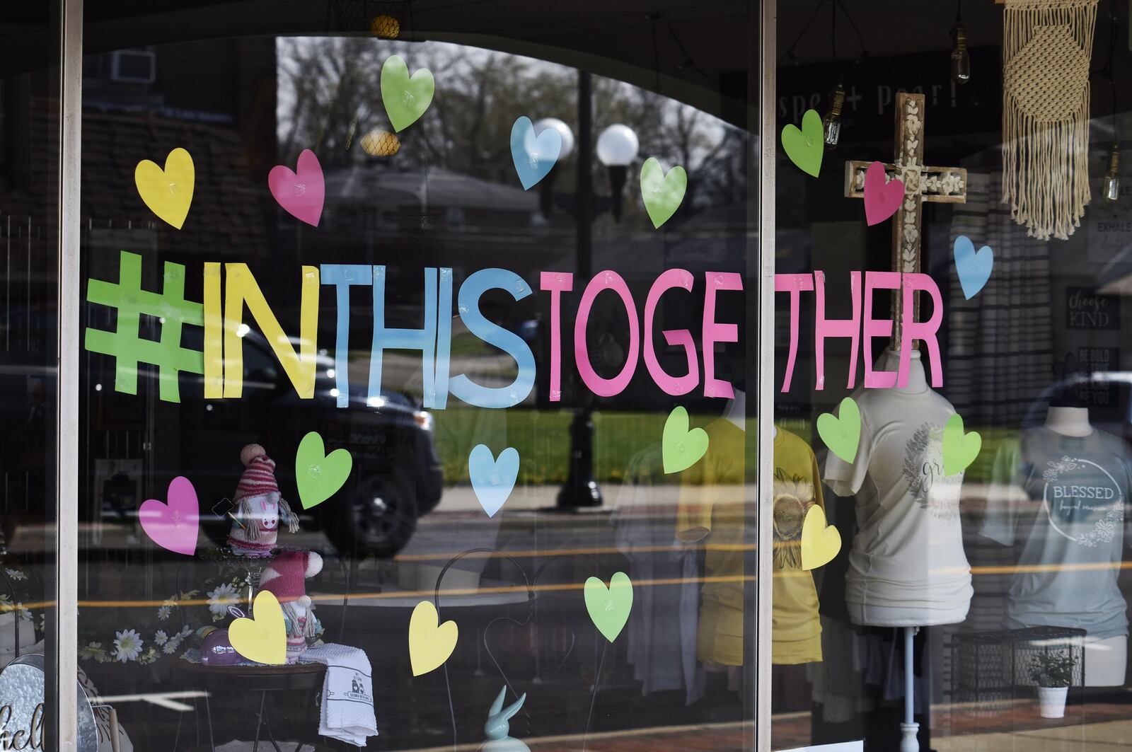 Scattering Joy Craft Boutique on Main Street in Hamilton has hearts on the window like many businesses in Butler County showing support for the community during the coronavirus pandemic Monday, April 6, 2020. NICK GRAHAM/STAFF