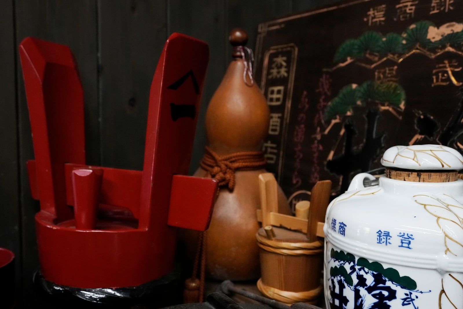 Traditional containers to keep Japanese sake are placed for decorations at a room shown during a media tour at the Ozawa Sake Brewery in Ome, on the western outskirts of Tokyo, Japan, Wednesday, Nov. 13, 2024. (AP Photo/Hiro Komae)