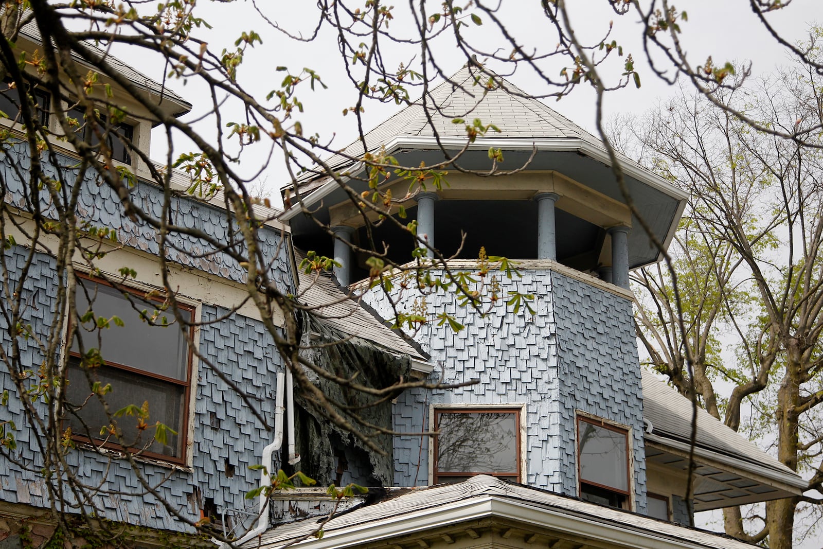 An open porch on the third floor of the Cox Mansion, topped by a polygonal tower, offers view of the surrounding neighborhood. LISA POWELL / STAFF