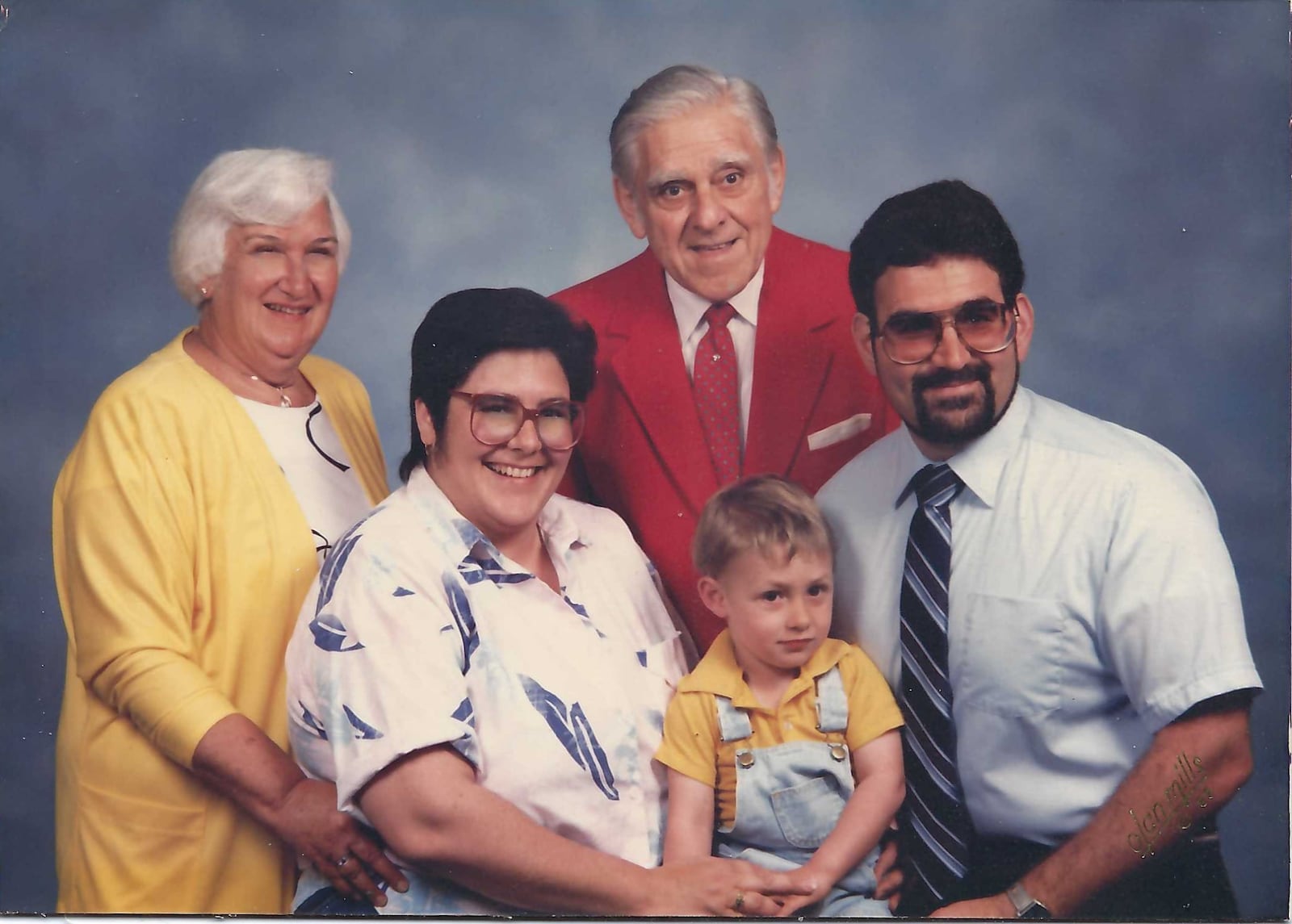 Pictured is Tina Osso of Hamilton with her son, Monjoni, her late parents and late brother.