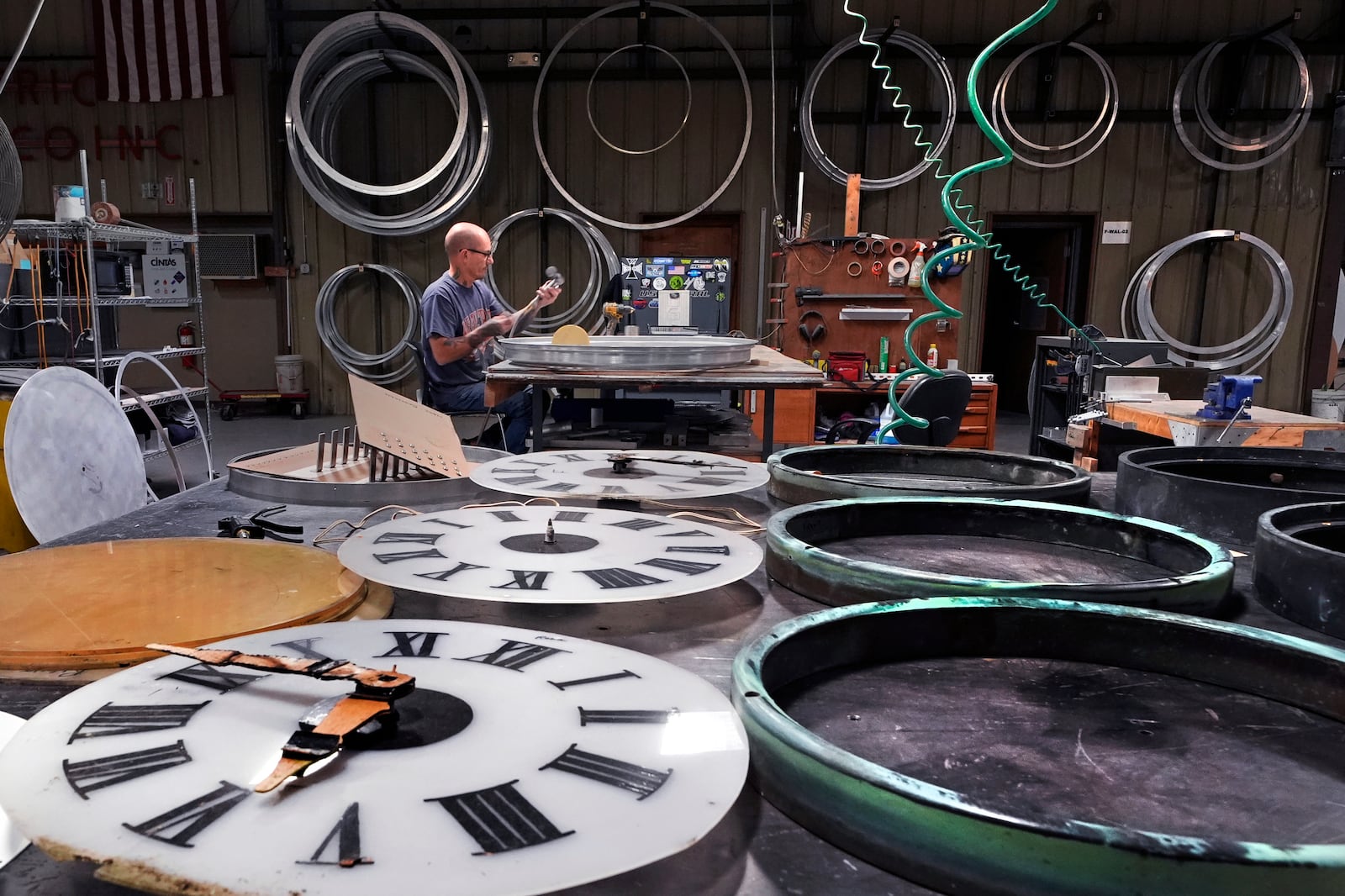 Clockmaker Jim Gongoleski works on restoring the Eastman monument clock, Wednesday, Oct. 30, 2024, in Medfield, Mass. (AP Photo/Charles Krupa)