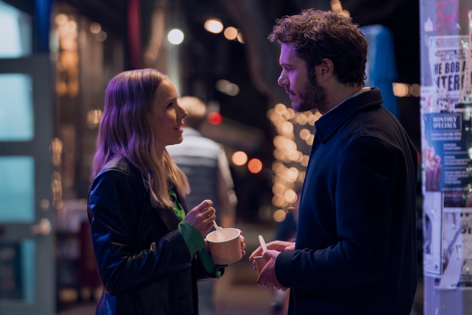 This image released by Netflix shows Kristen Bell, left, and Adam Brody in a scene from "Nobody Wants This." (Stefania Rosini/Netflix via AP)