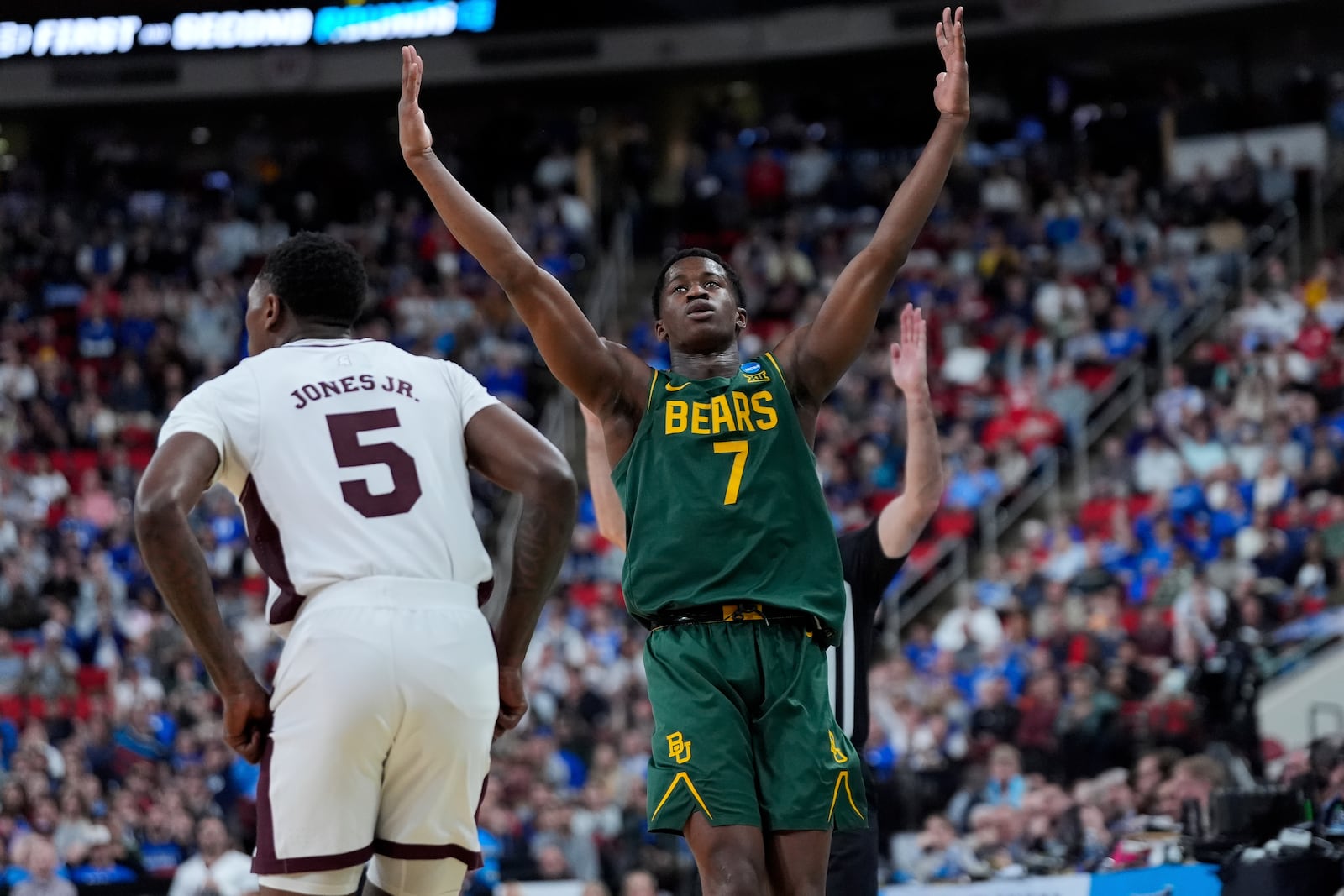 Baylor guard VJ Edgecombe (7) celebrates after making a three-point shot during the second half in the first round of the NCAA college basketball tournament against Mississippi State, Friday, March 21, 2025, in Raleigh, N.C. (AP Photo/Stephanie Scarbrough)