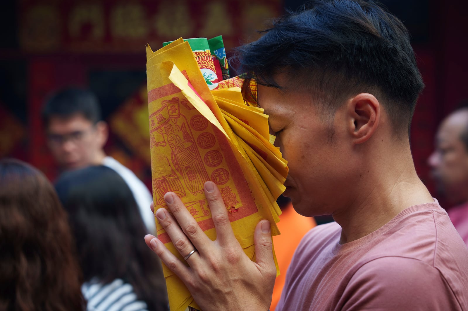 Malaysian ethnic Chinese pray on the first day of Lunar New Year at Guandi Temple, in Kuala Lumpur, Malaysia, Wednesday, Jan. 29, 2025. (AP Photo/Vincent Thian)